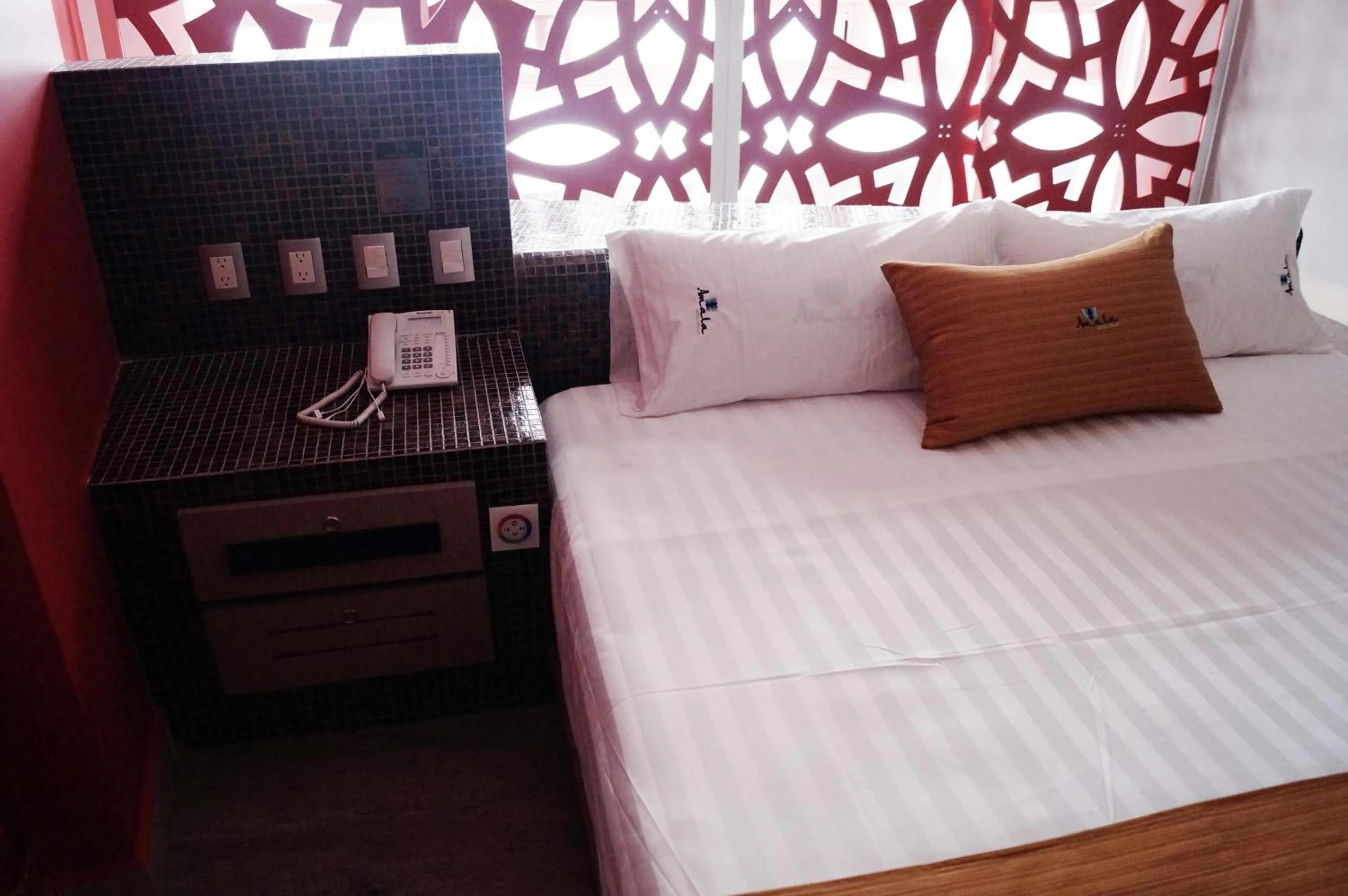 Bed in Hotel Amala