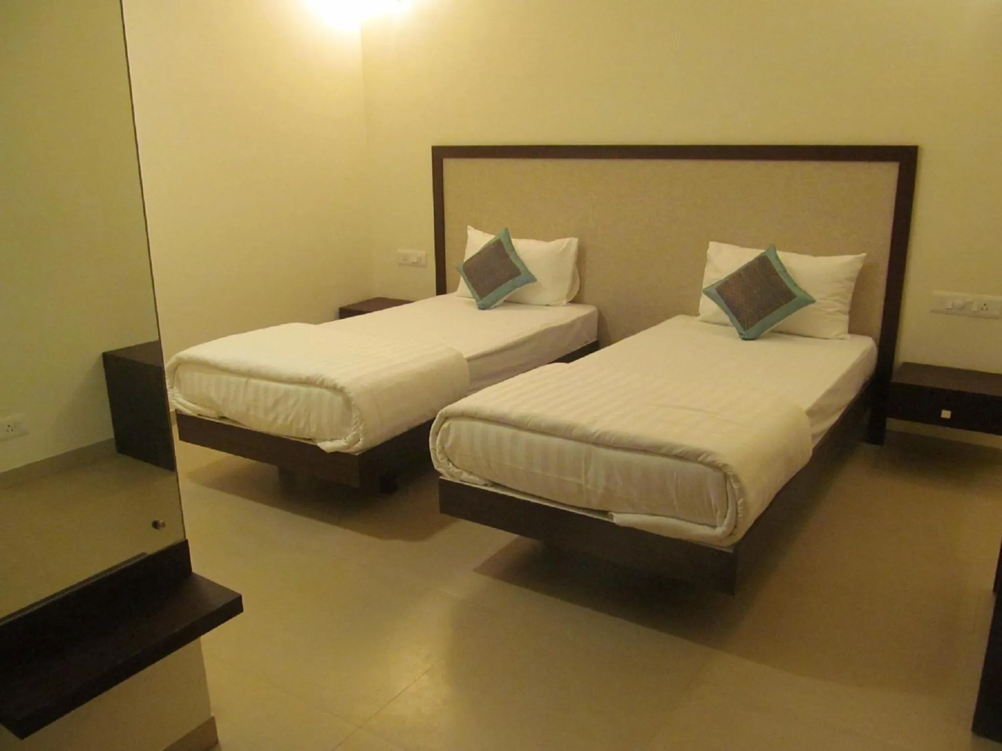Bed in Ixora Suites