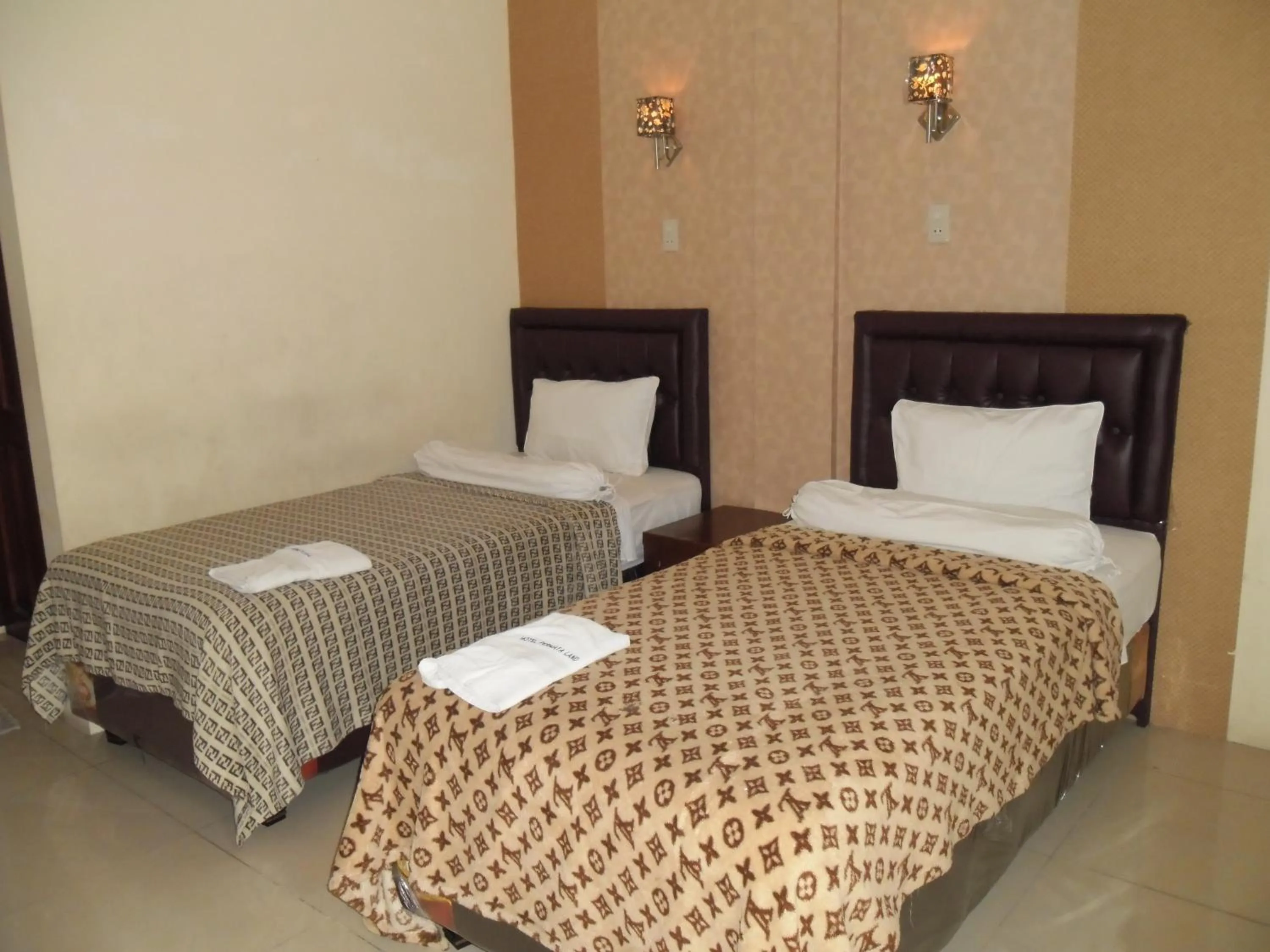 Bed in Permata Land Hotel & Resort
