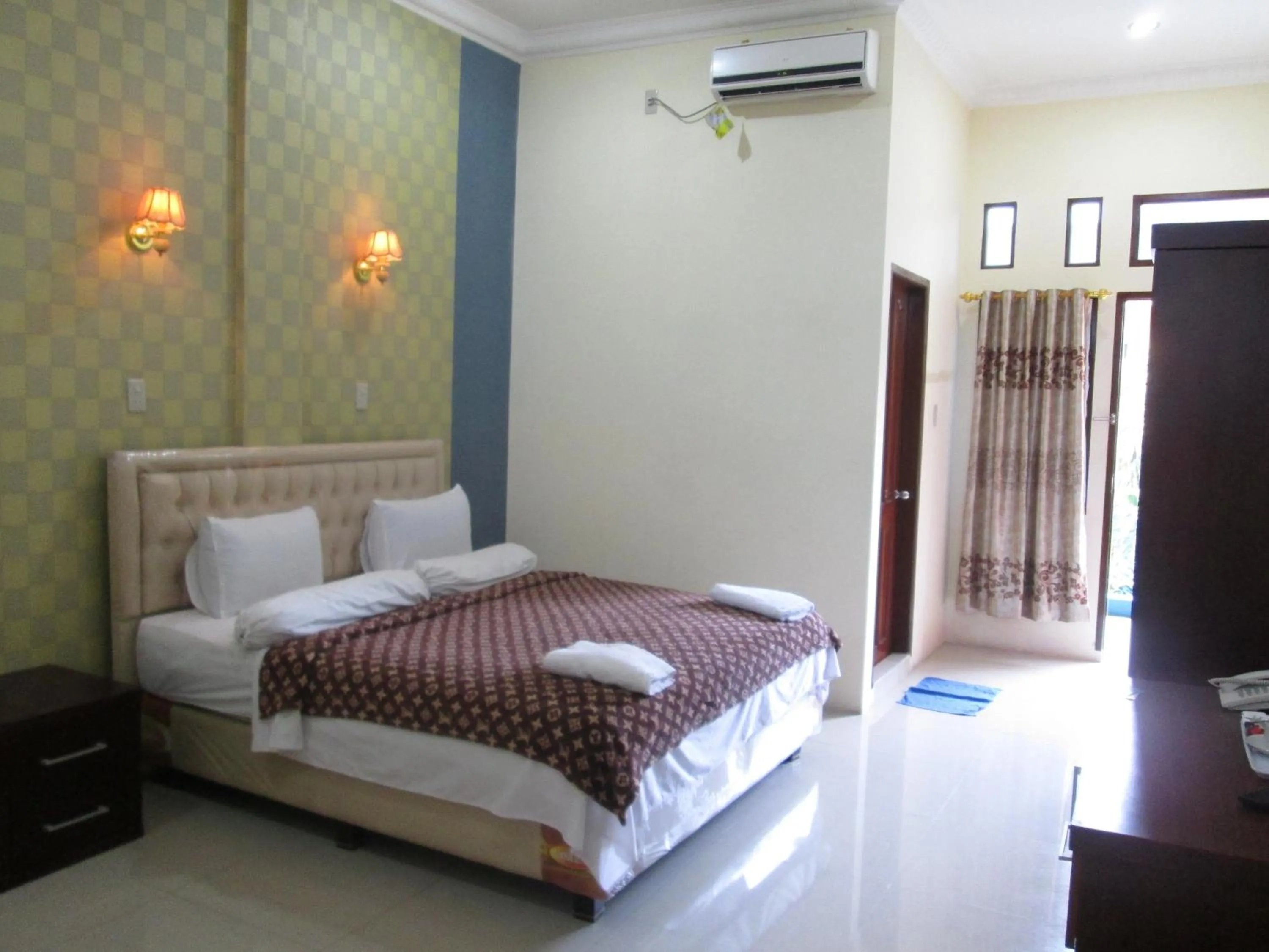 Decorative detail, Bed in Permata Land Hotel & Resort