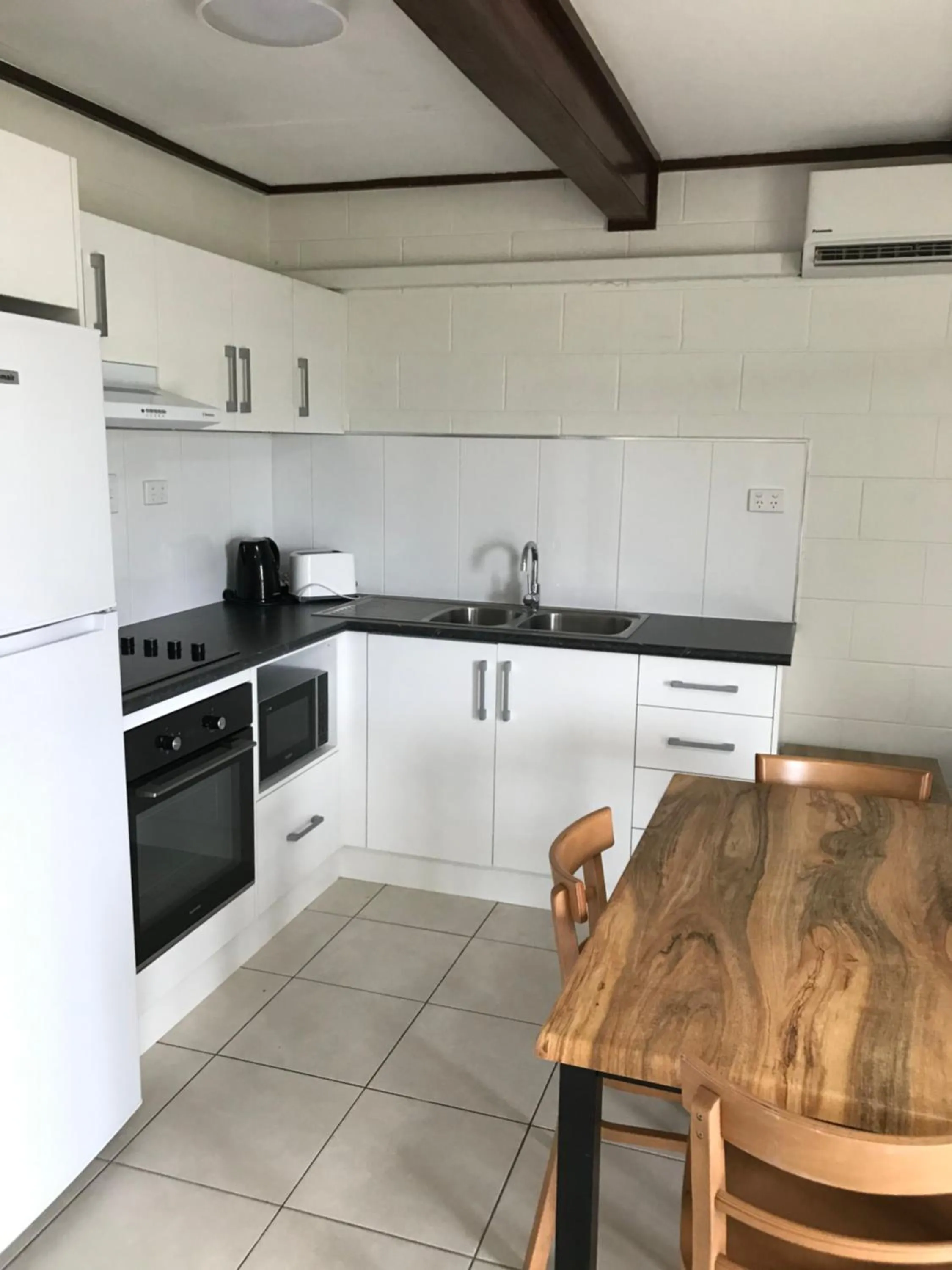 Kitchen or kitchenette in Ocean Breeze Units