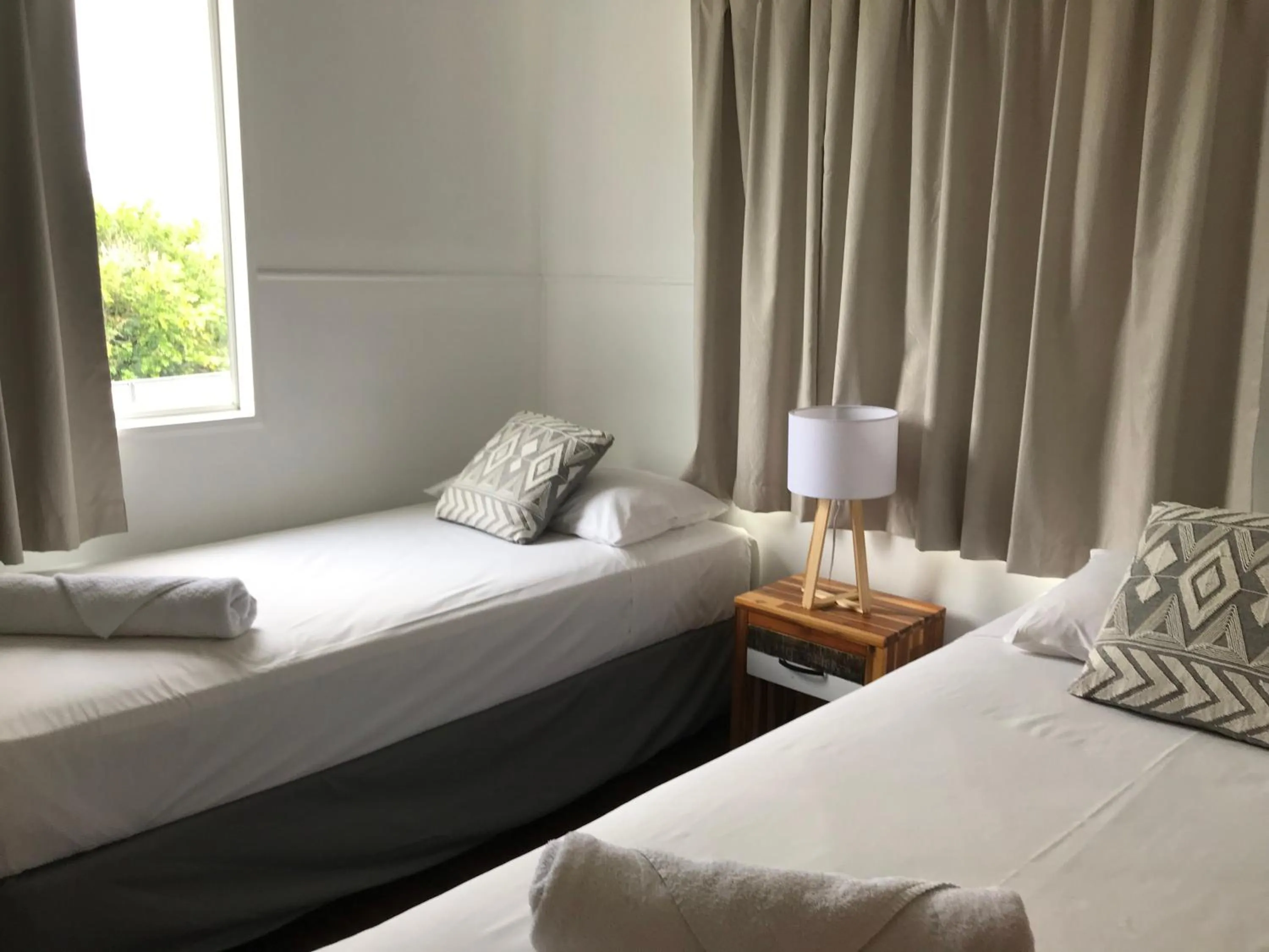 Bedroom, Bed in Ocean Breeze Units