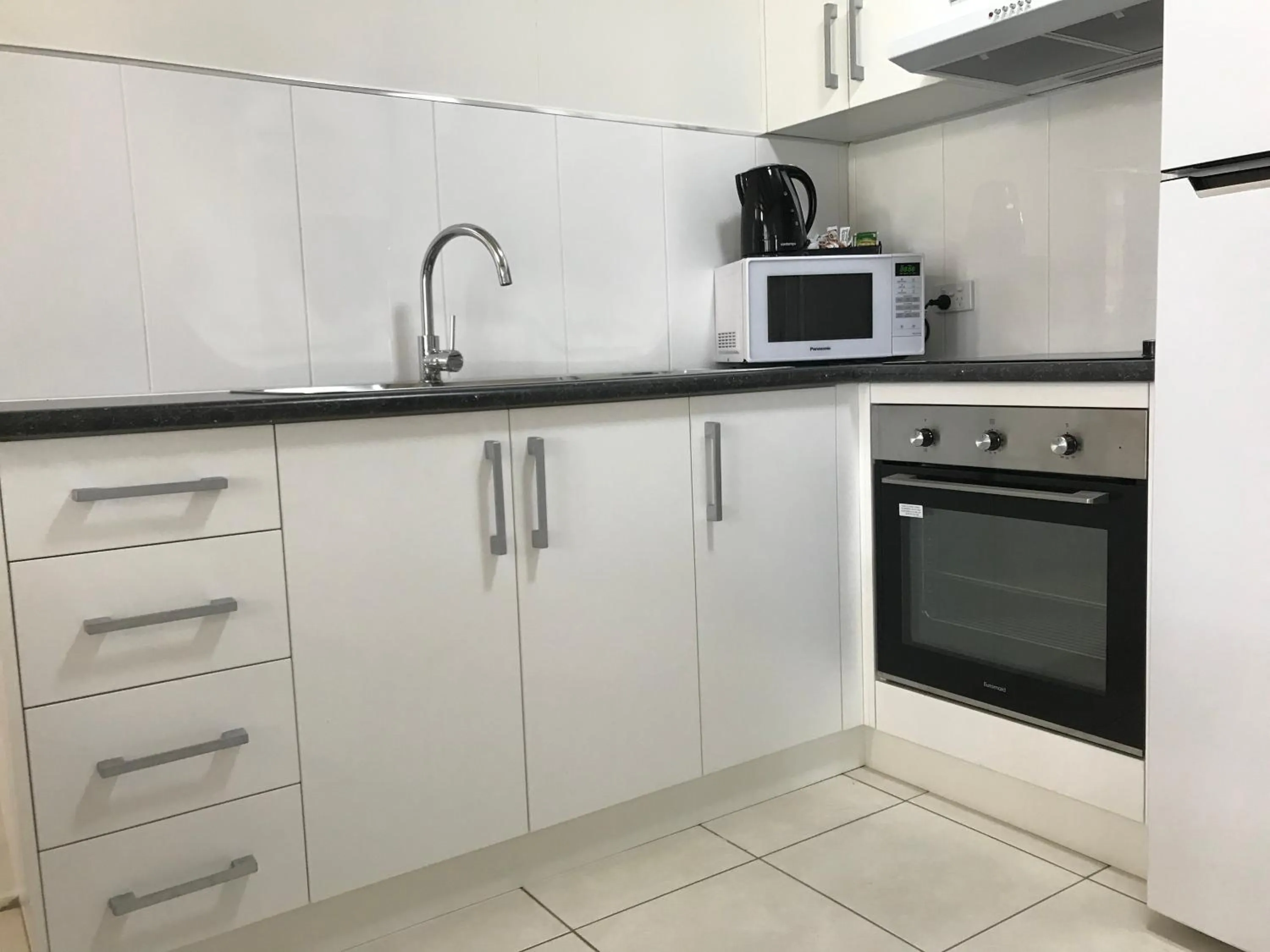 Kitchen or kitchenette in Ocean Breeze Units