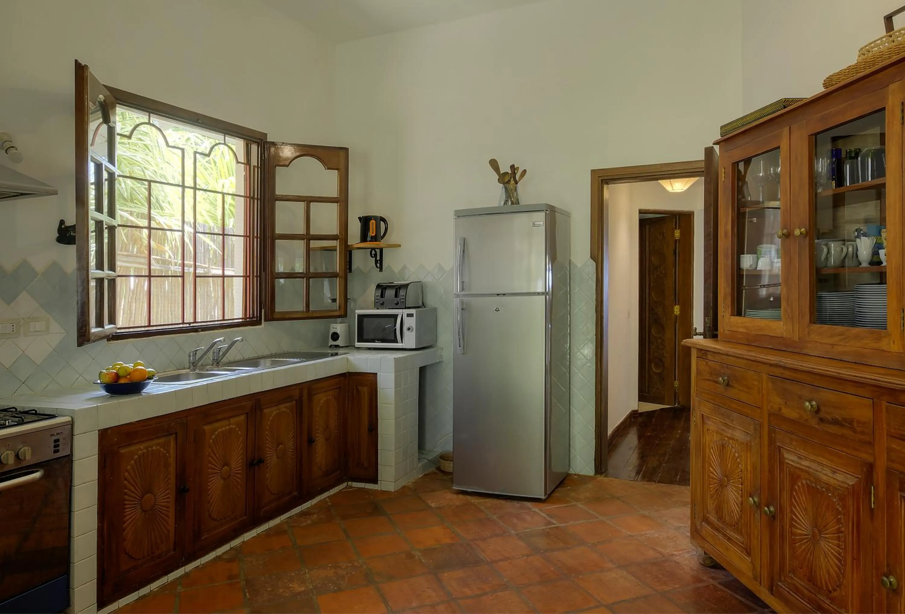 Kitchen or kitchenette in Kobe Suite Resort