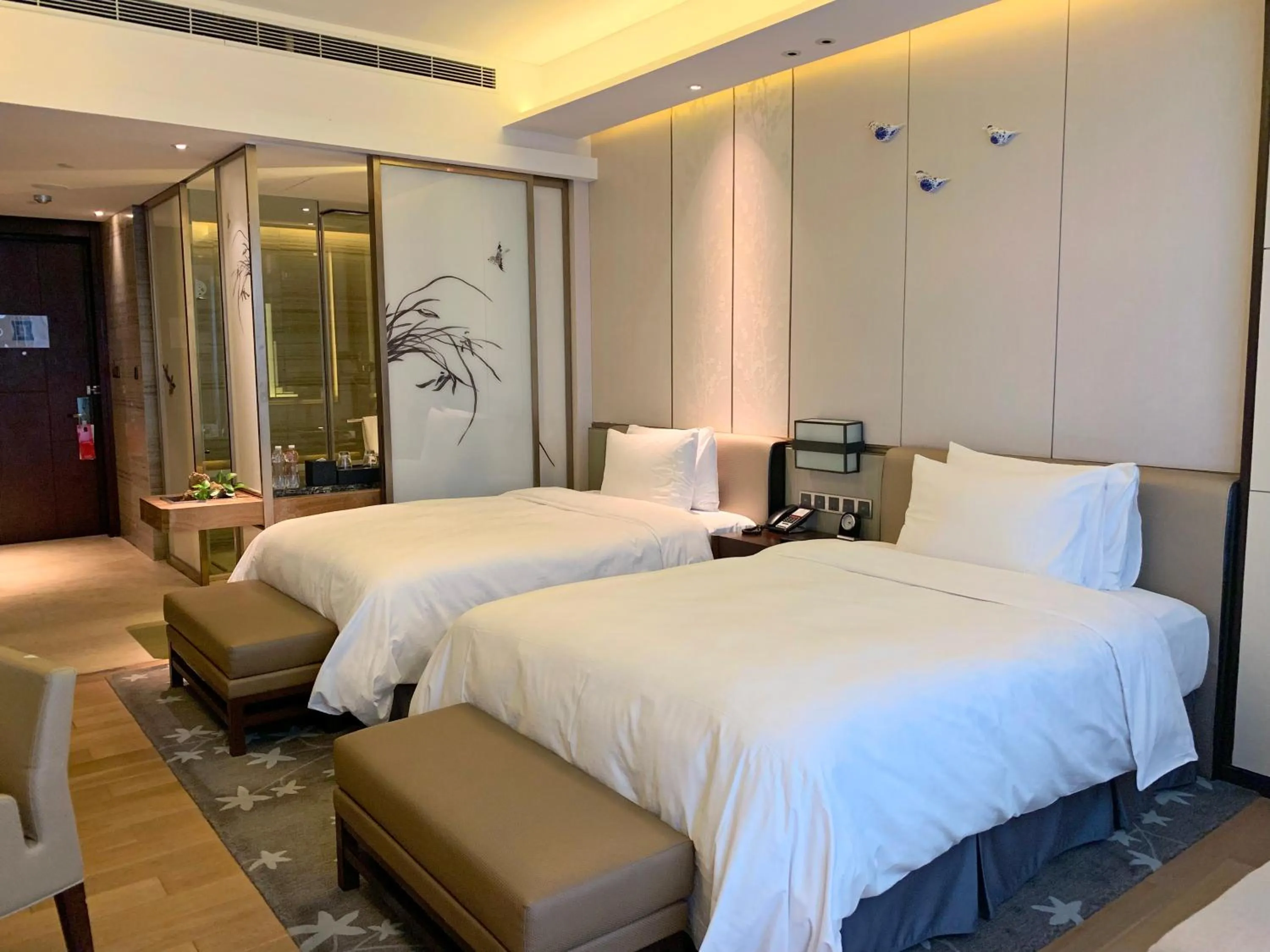 Bedroom, Bed in HUALUXE Hotels & Resorts Nanchang High-Tech Zone, an IHG Hotel