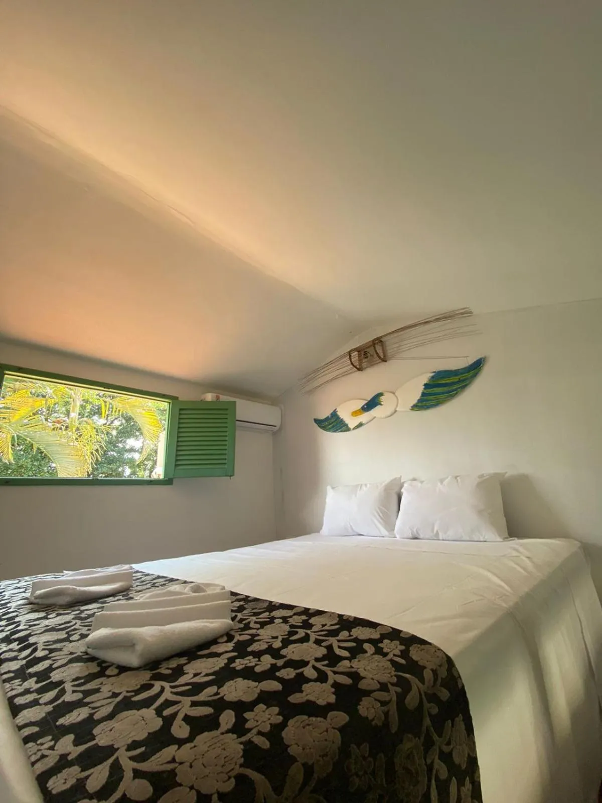 Bed in Pousada Maracaju