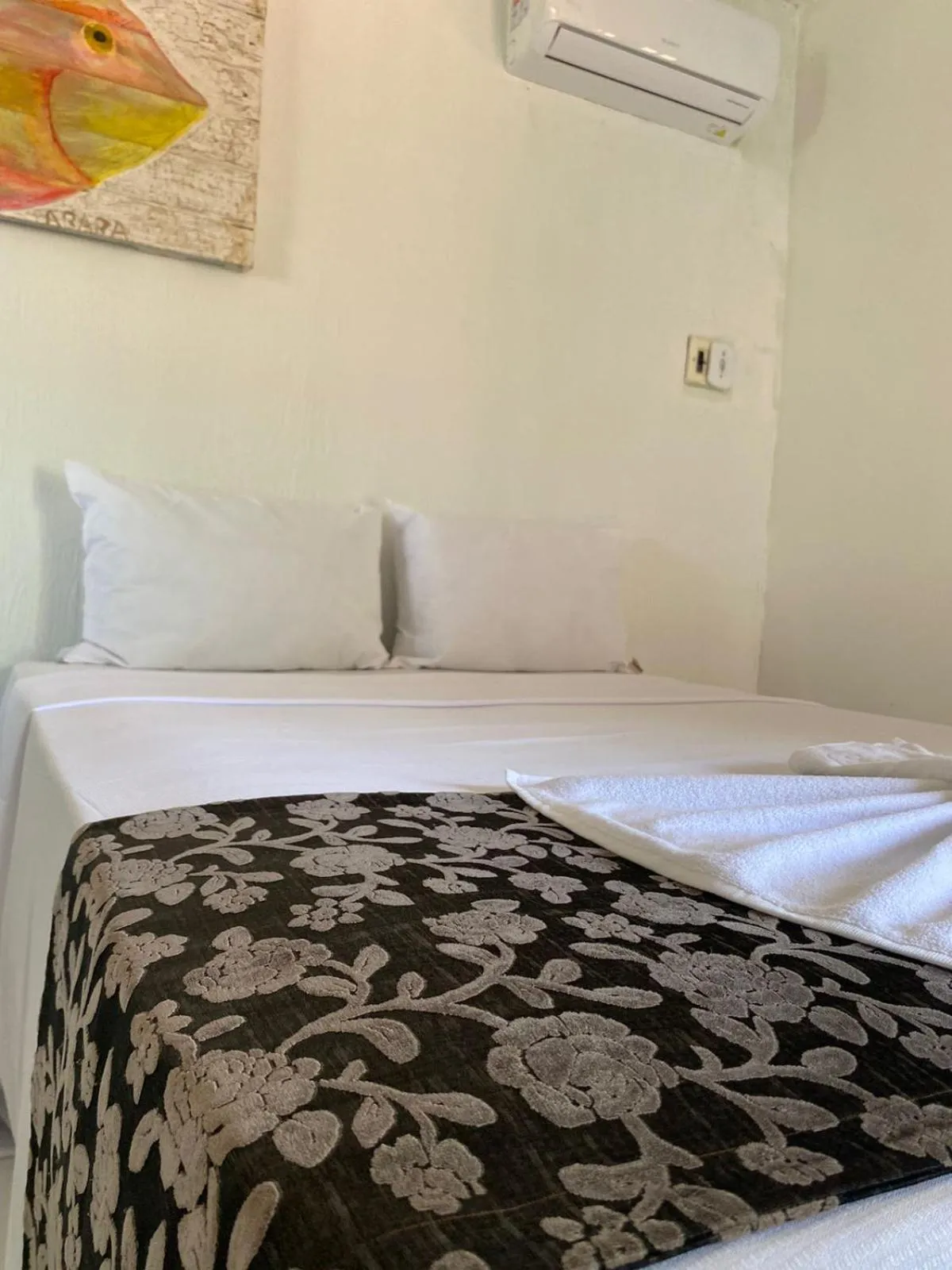 Bed in Pousada Maracaju