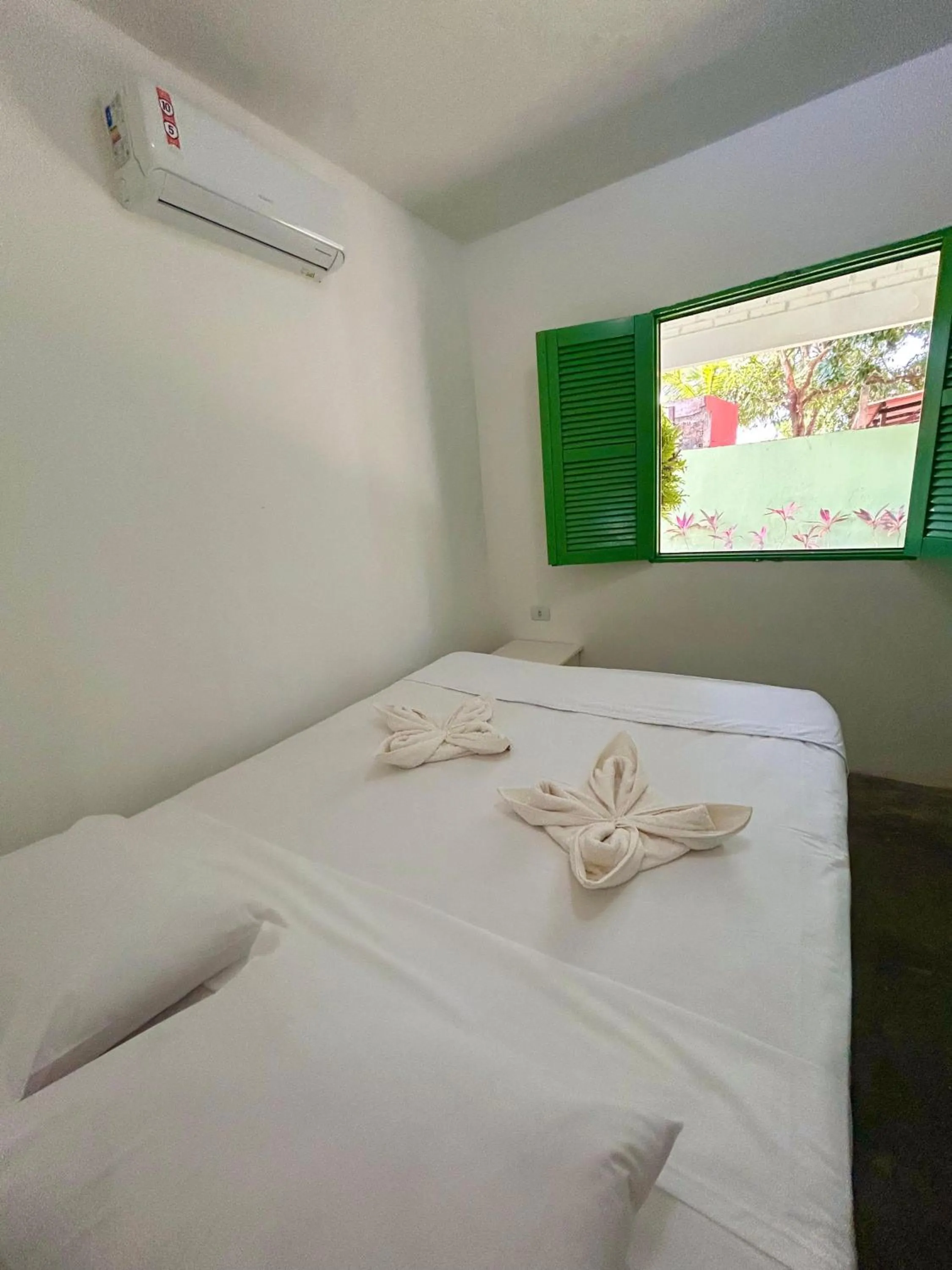 Bed in Pousada Maracaju