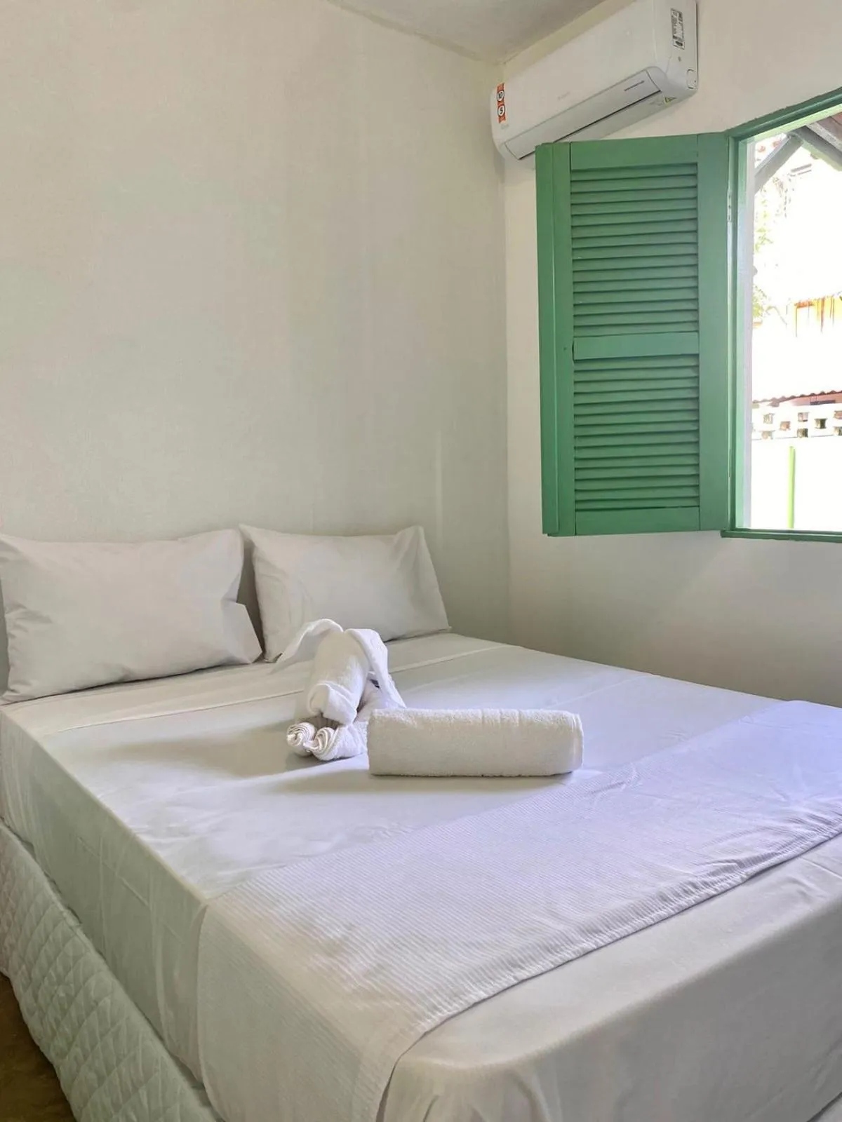 Bed in Pousada Maracaju