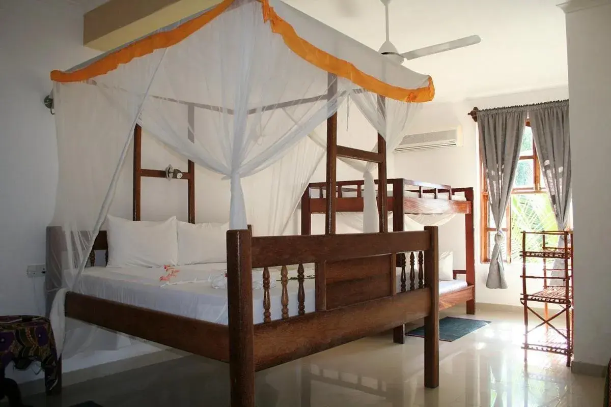 Quadruple Room with Garden View in Moonshine Uroa Boutique Hotel Quadruple Room with Garden View in Moonshine Uroa Boutique Hotel