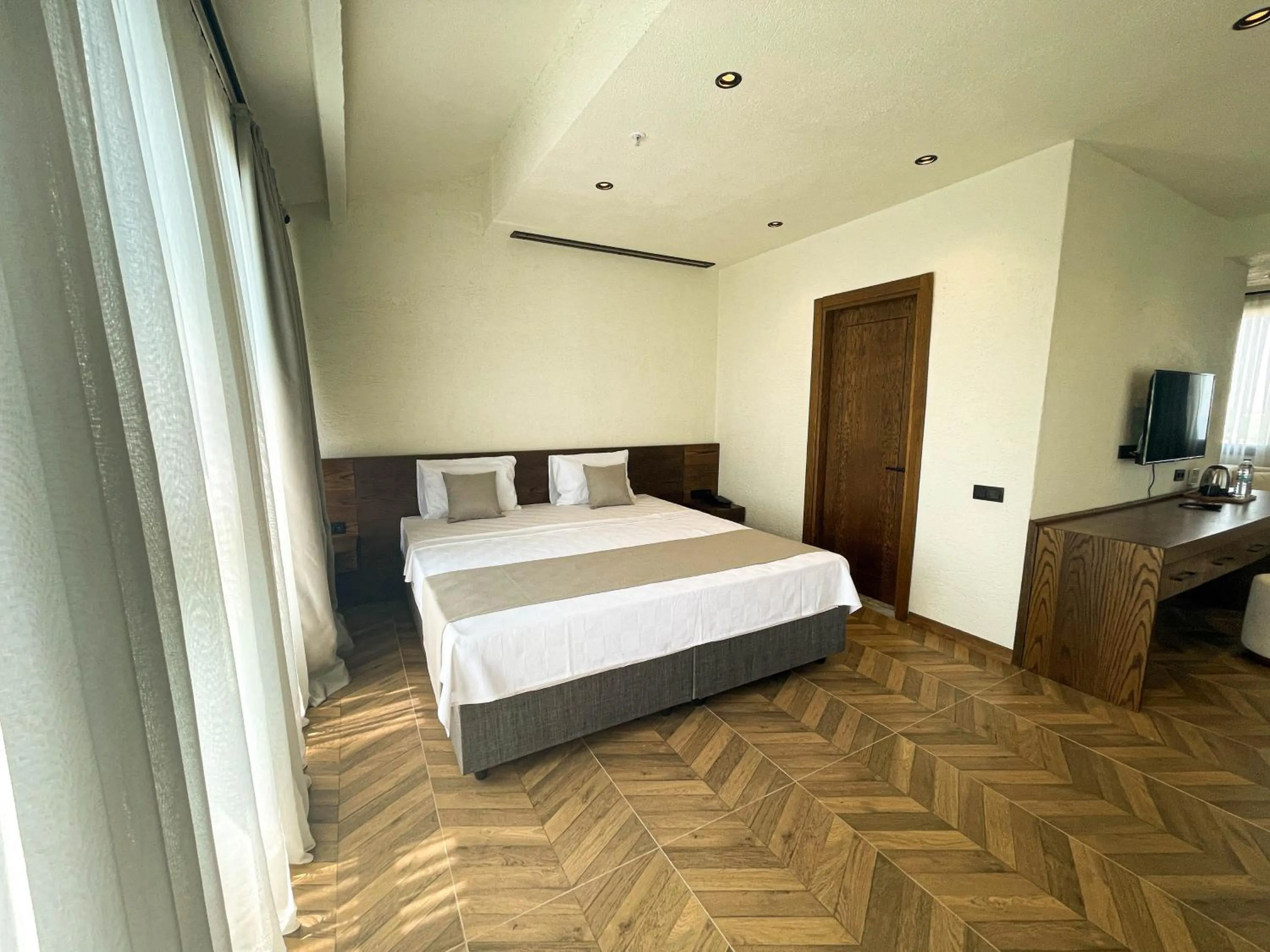 Photo of the whole room, Bed in Now Boutique Hotel