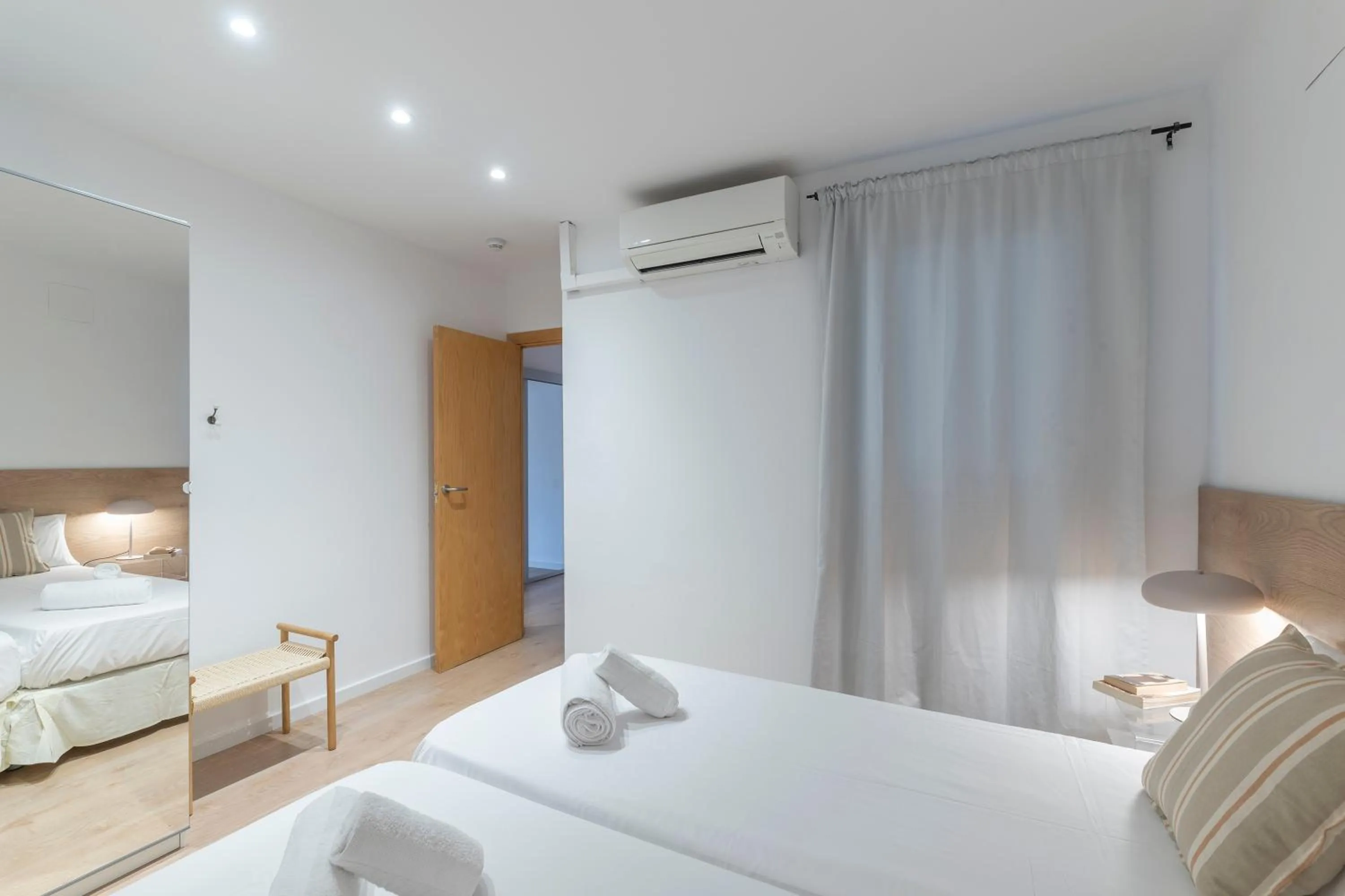 Bed in Happy Apartments