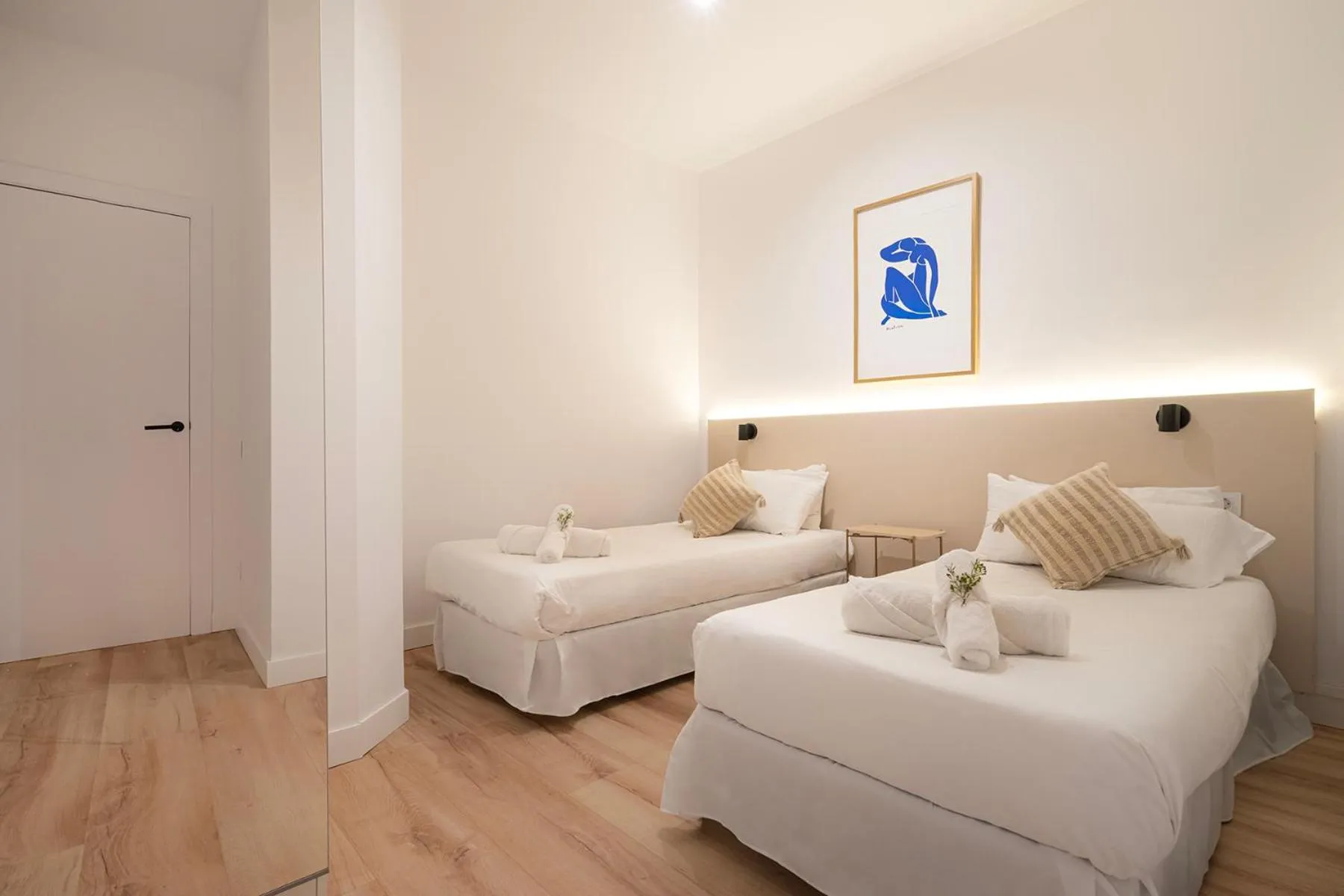 Bed in Happy Apartments