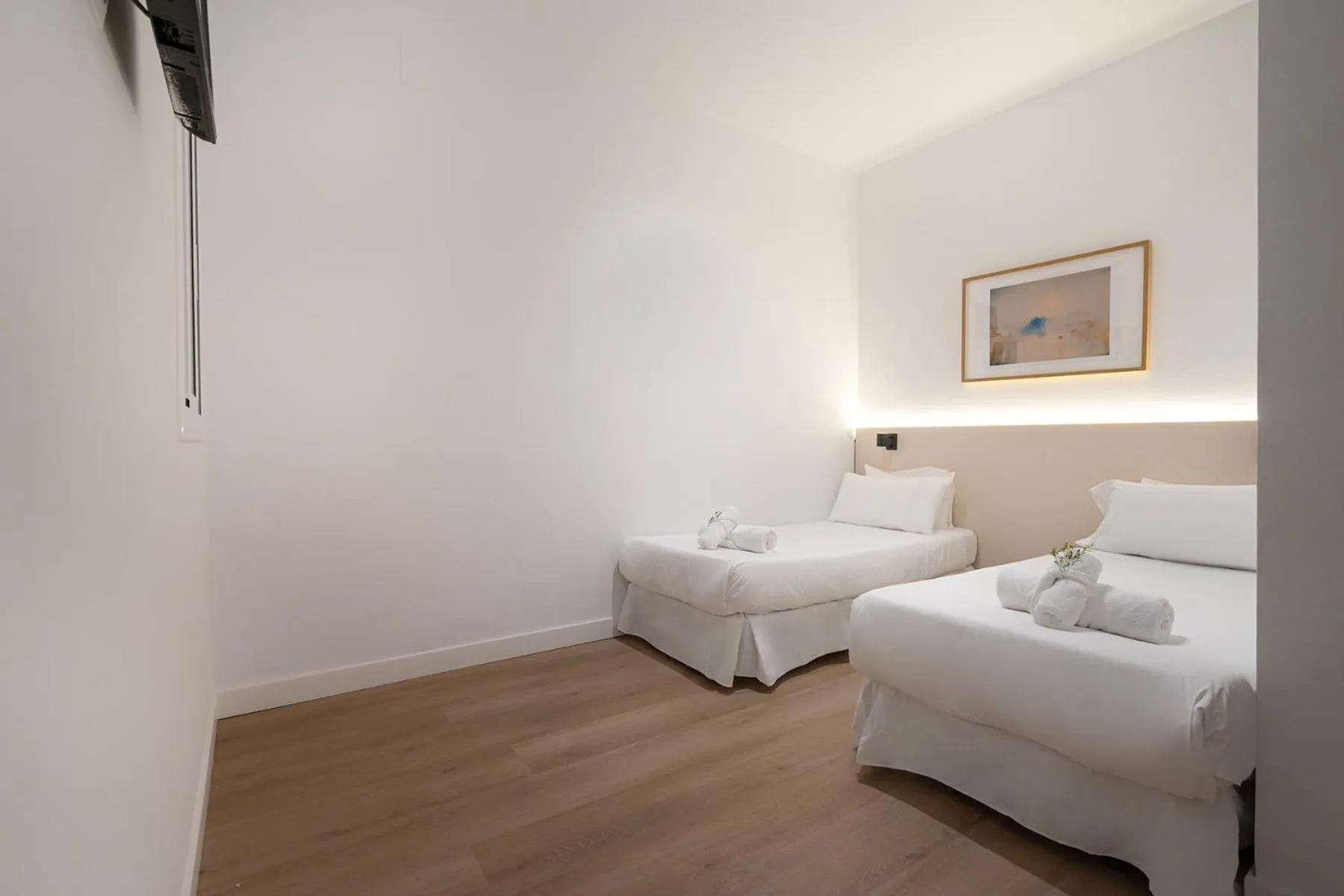 Bed in Happy Apartments