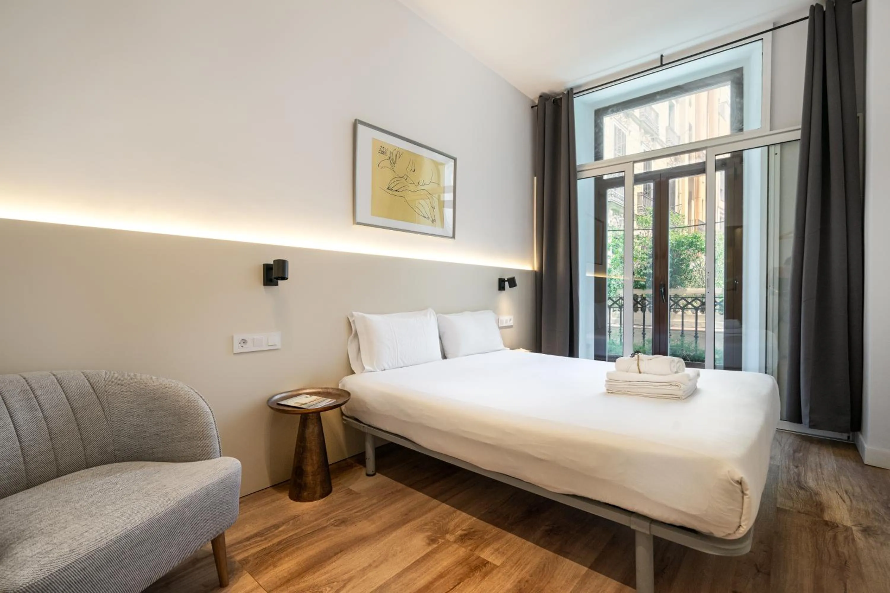 Bed in Happy Apartments