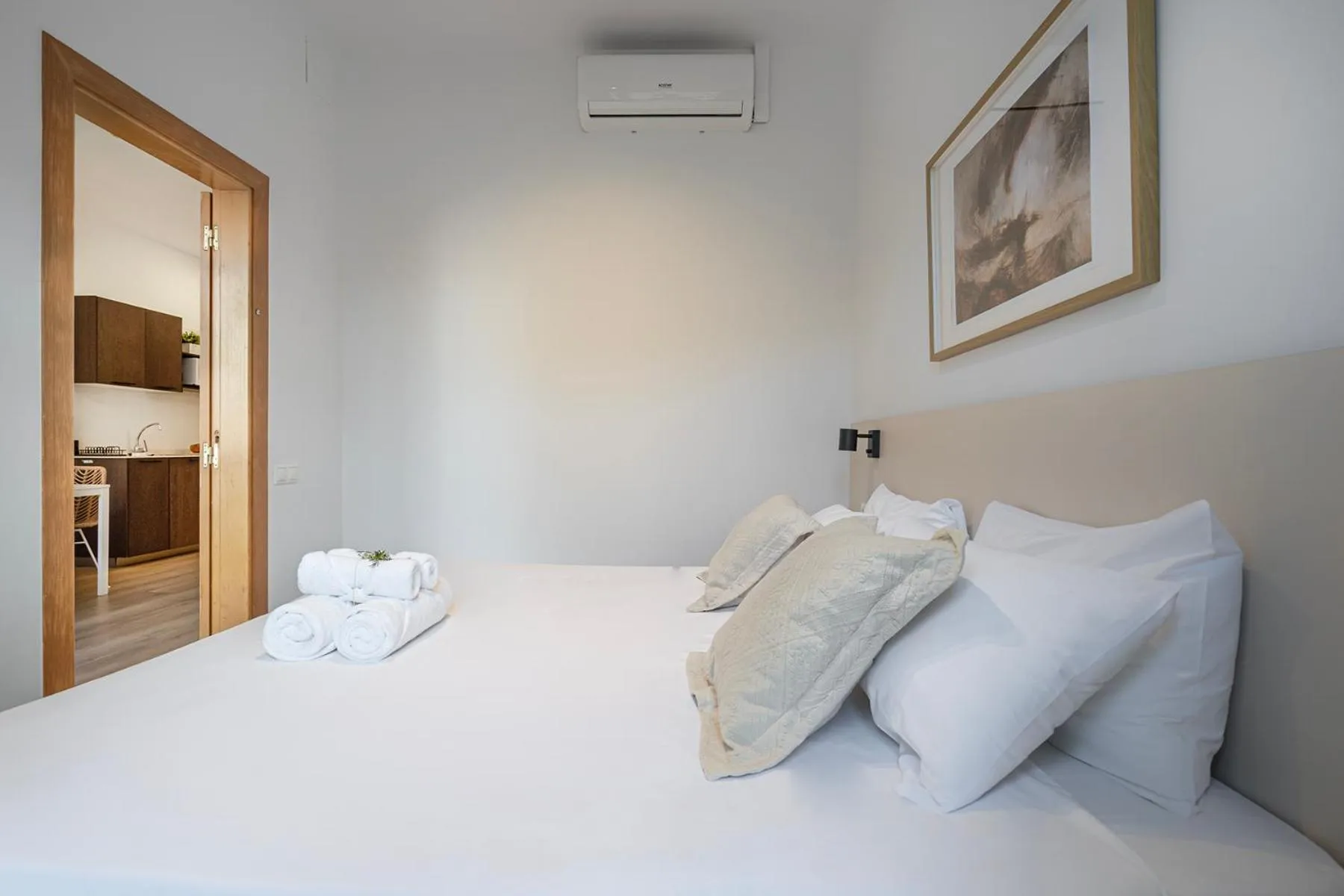 Bed in Happy Apartments