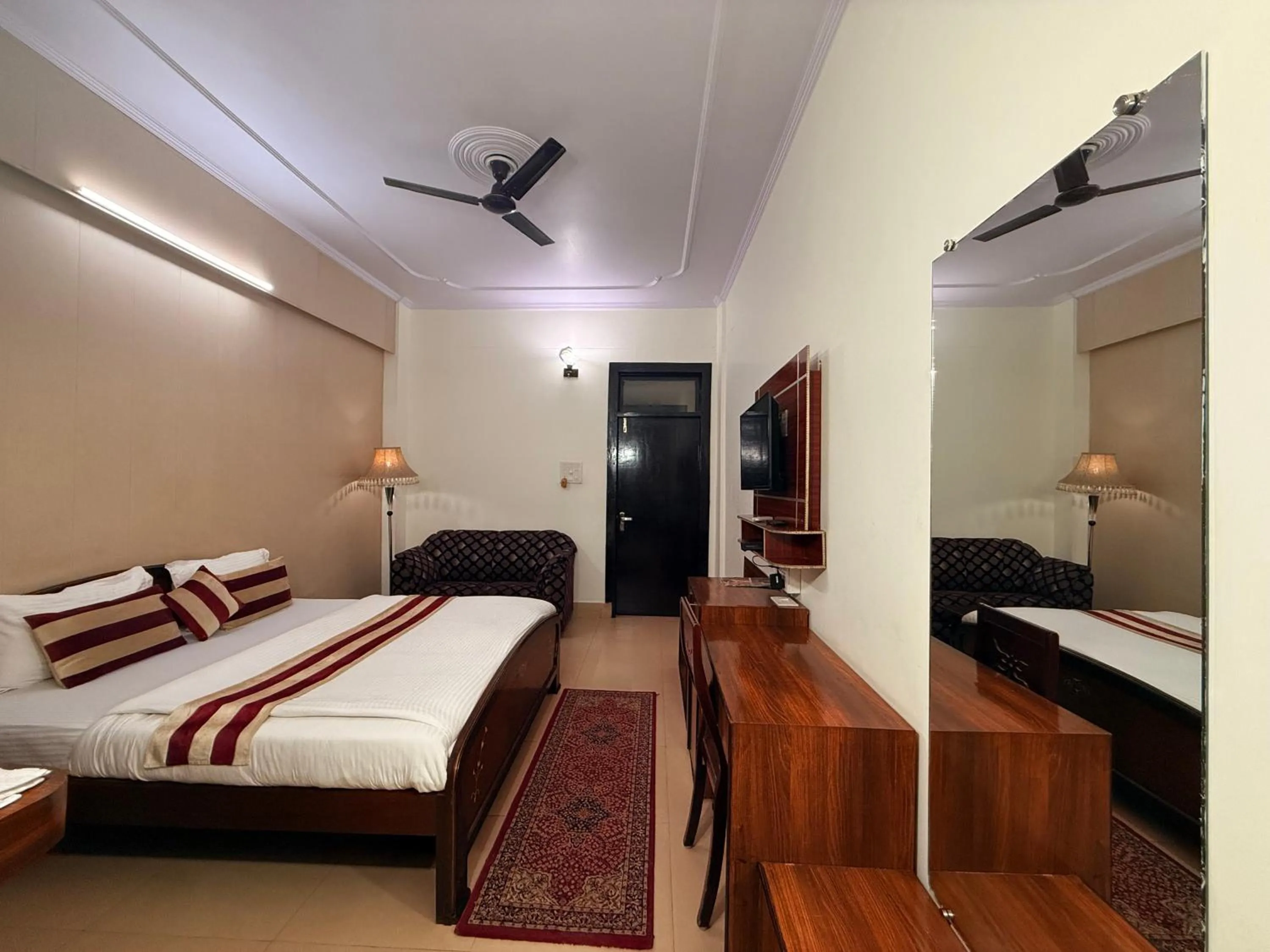 Bed in Hotel Mandakini