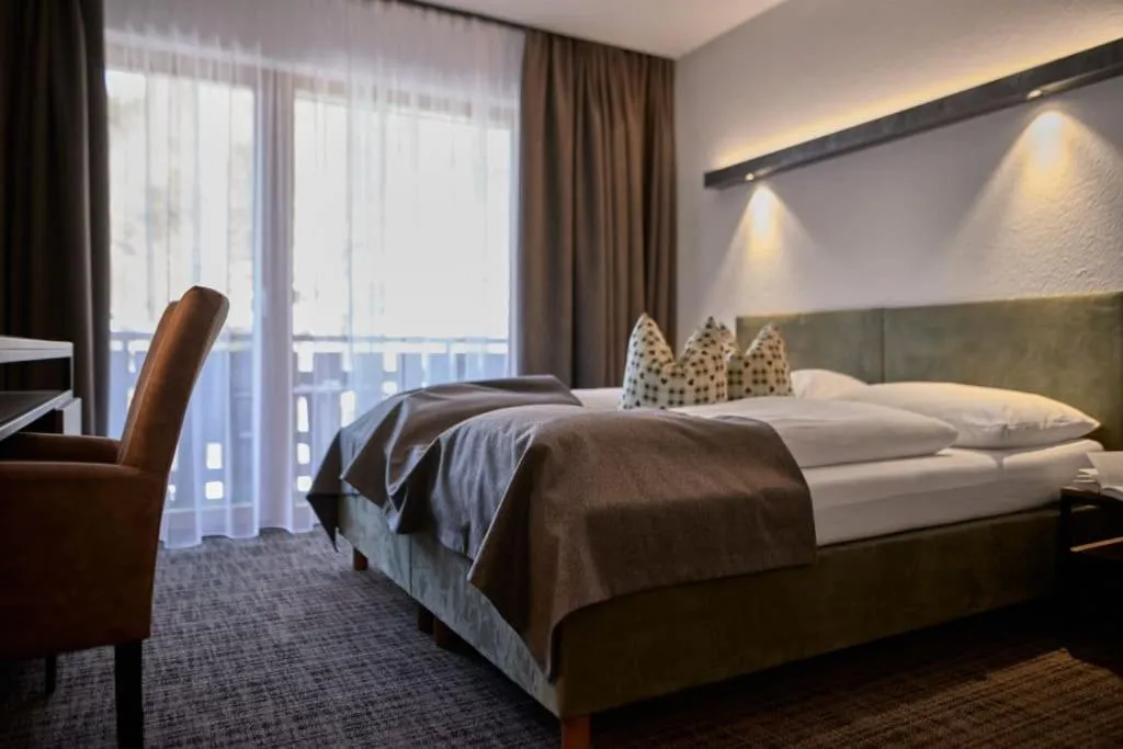 Bed in Panoramahotel Fliesserhof