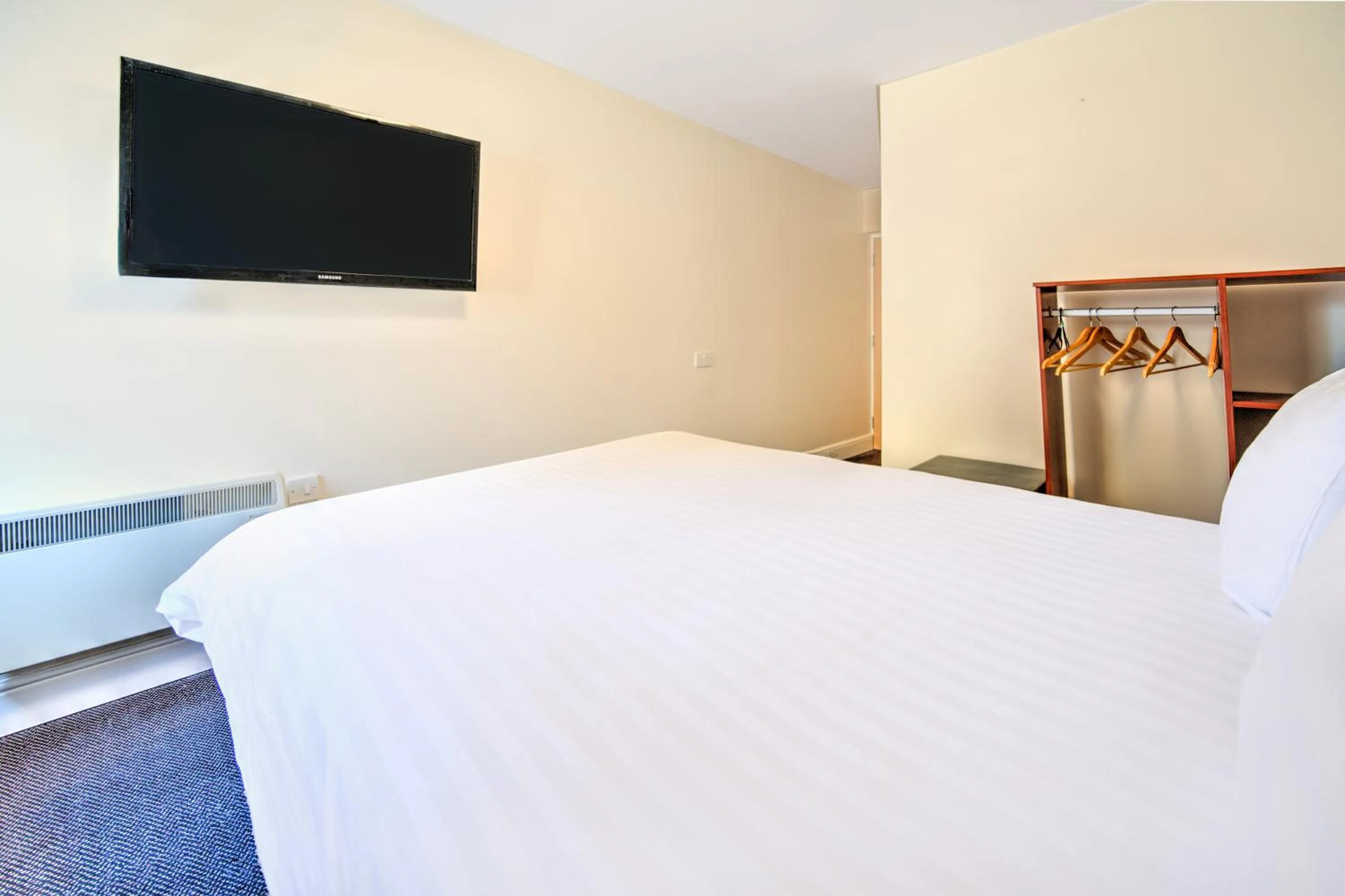 Bedroom, Bed in GO2 Gloucester Hotel by OYO