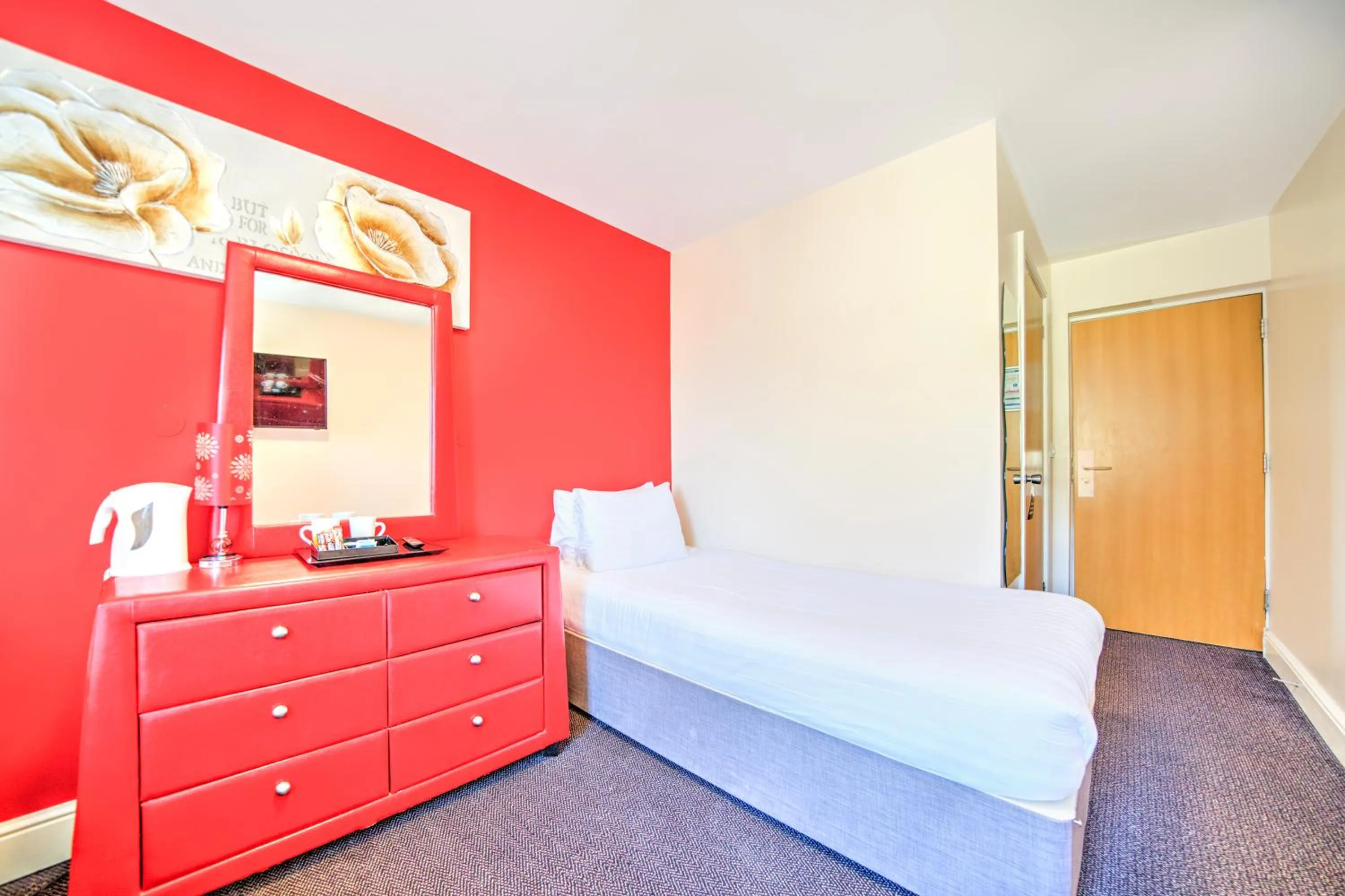 Photo of the whole room, Bed in GO2 Gloucester Hotel by OYO