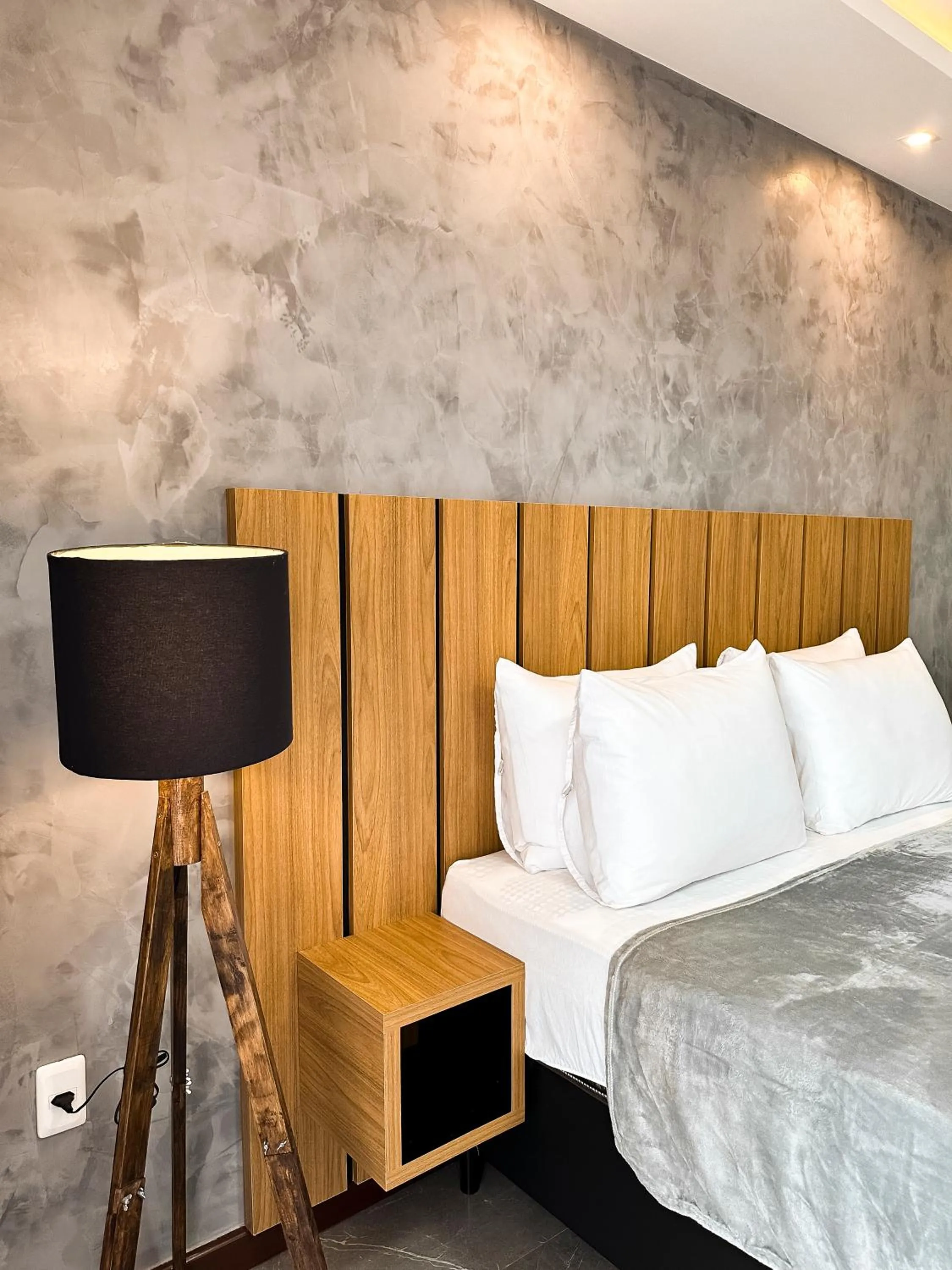 Bed in Aloha Palace Hotel