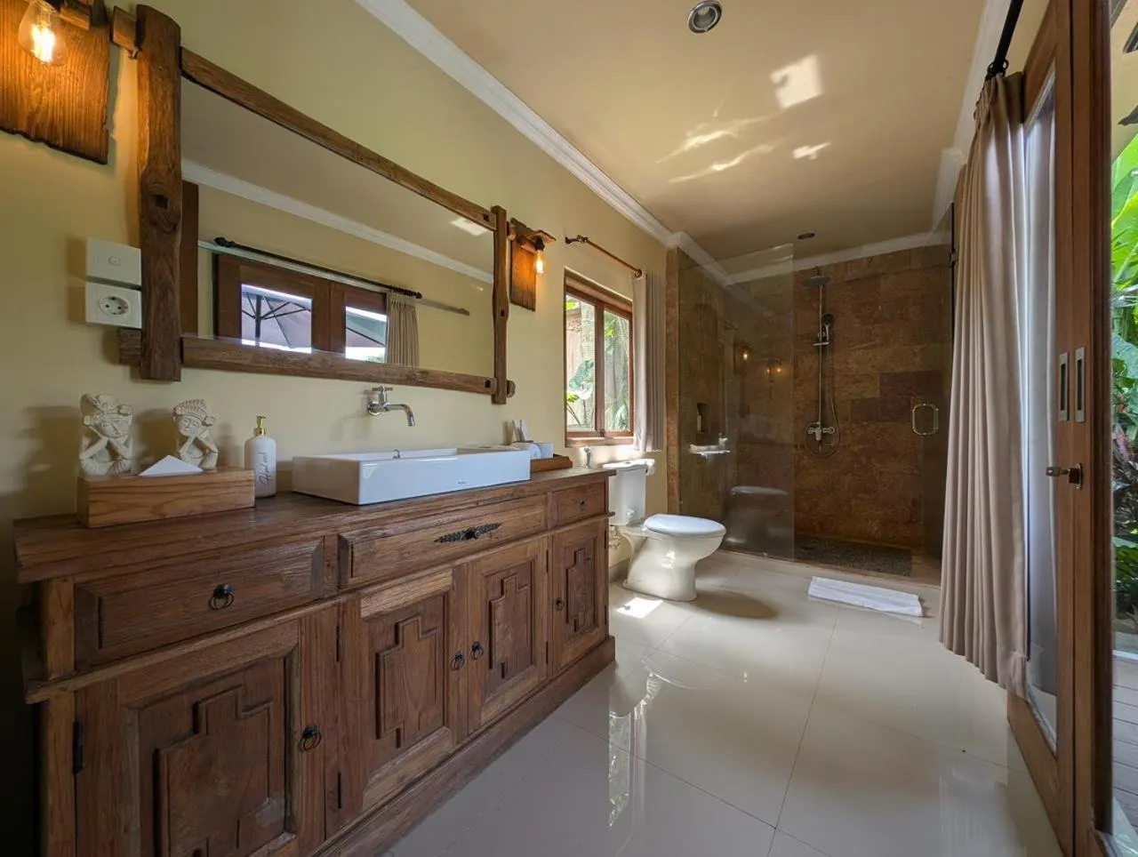 Bathroom in Taksu Resort Ubud by Dhananjaya Hospitality