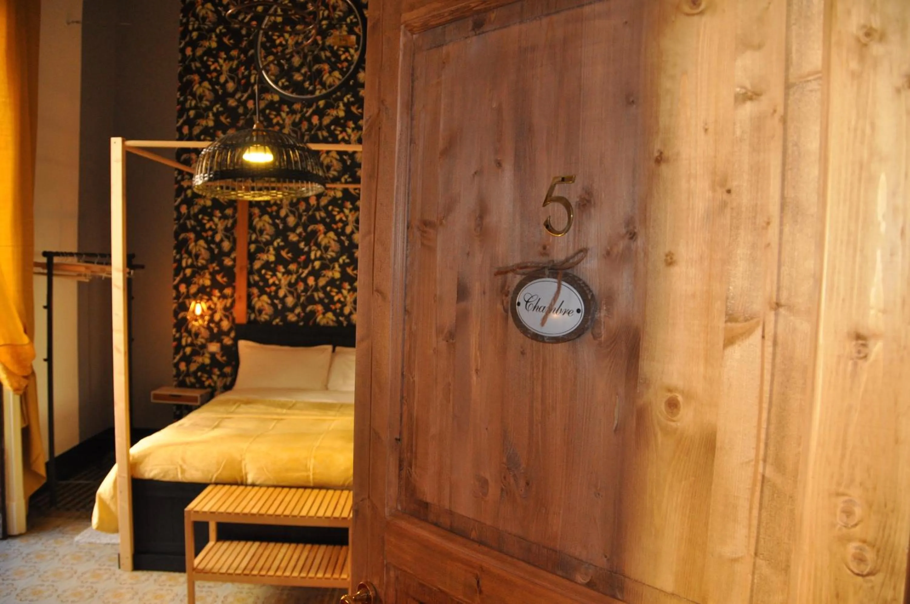 Decorative detail, Bed in Grand Tour Design Guest House Catania Self Check-in