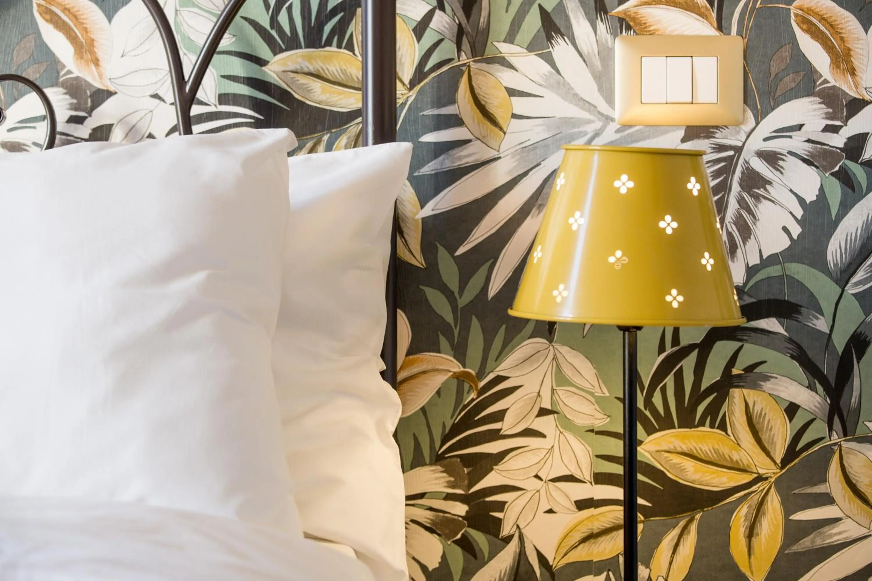 Decorative detail, Bed in Grand Tour Design Guest House Catania Self Check-in