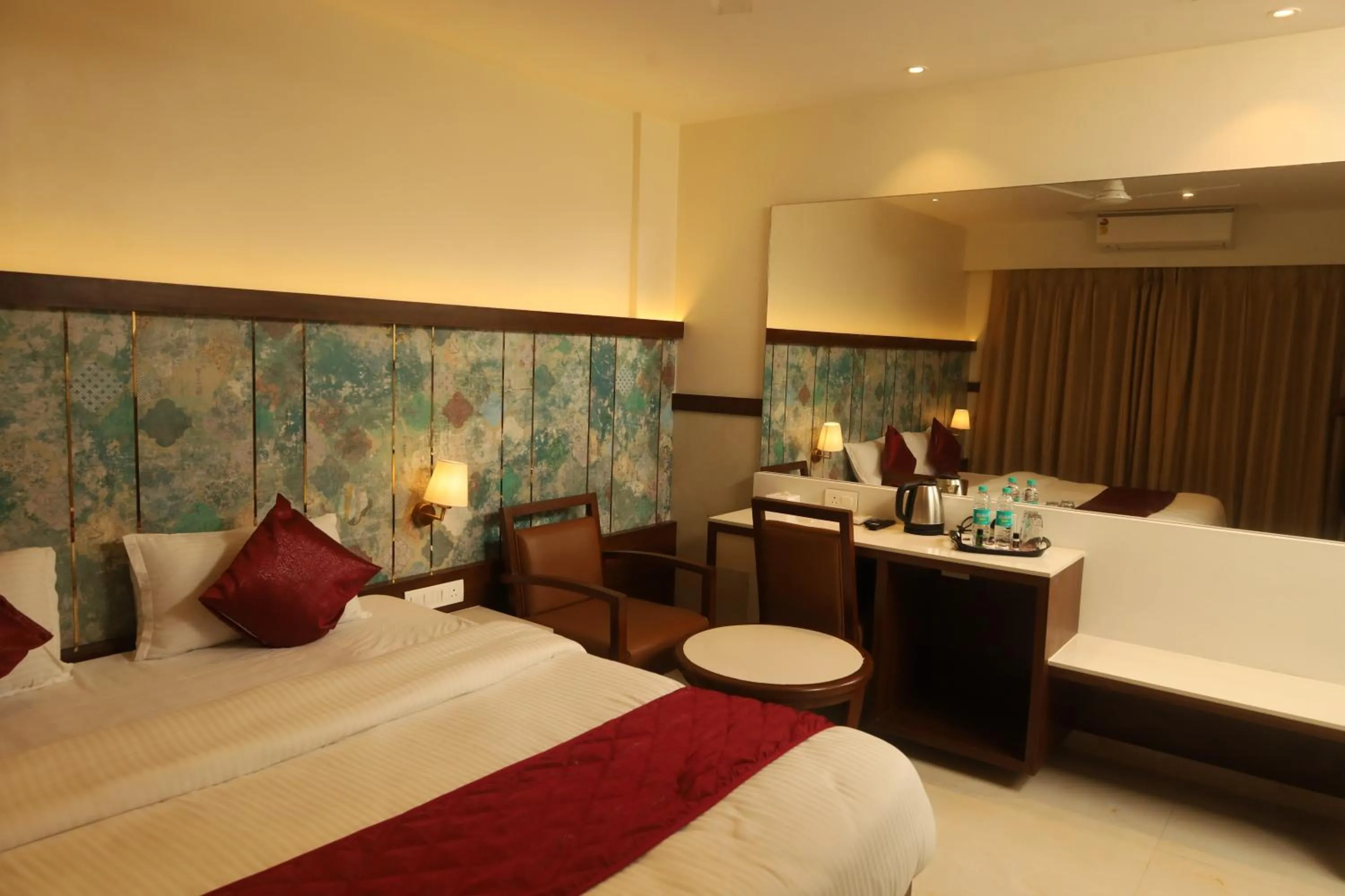 Bed in Hotel Prestige Residency