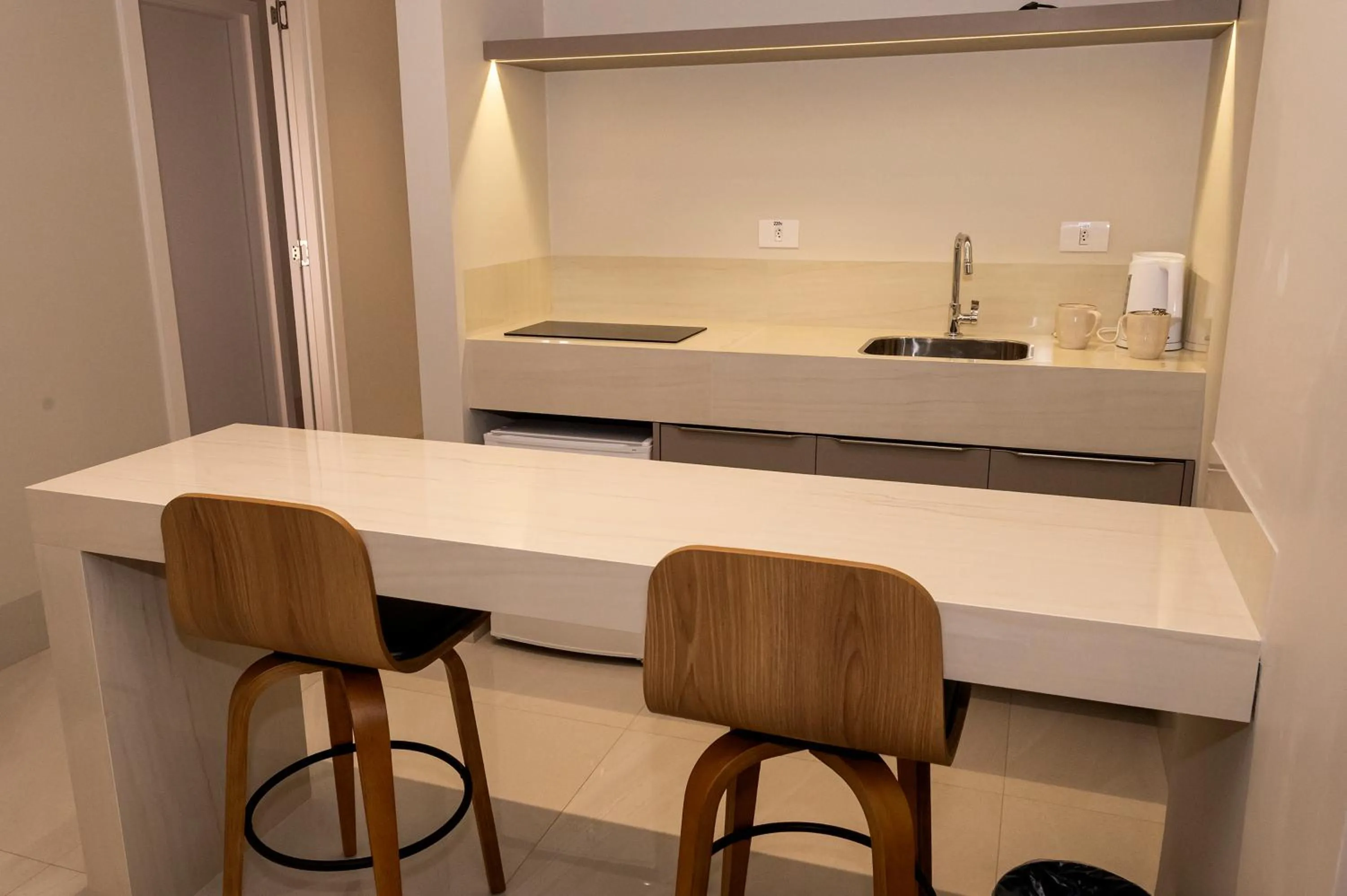 Kitchen or kitchenette in Riva Apart Hotel