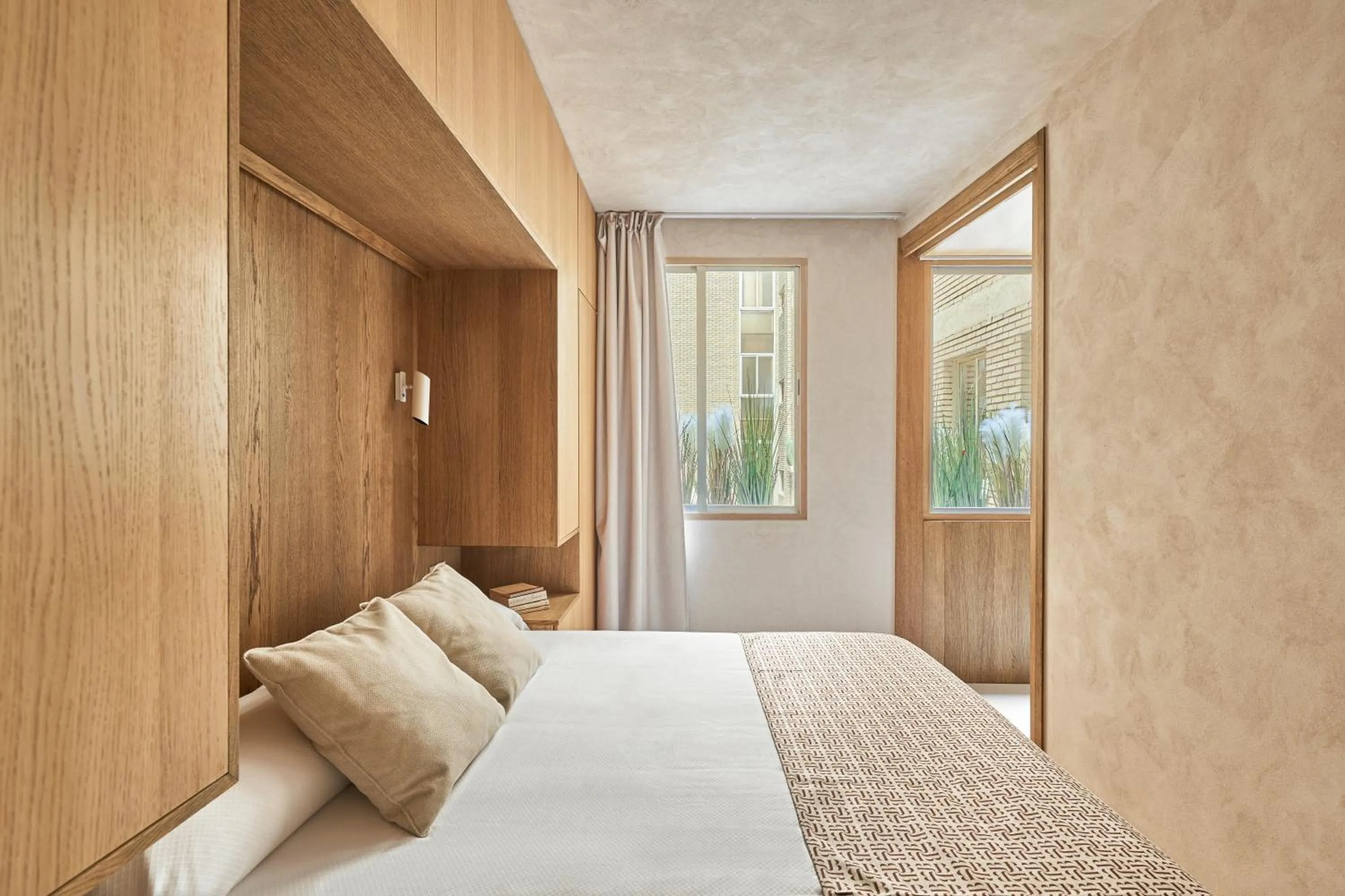 Bed in Apartamentos Juan Bravo