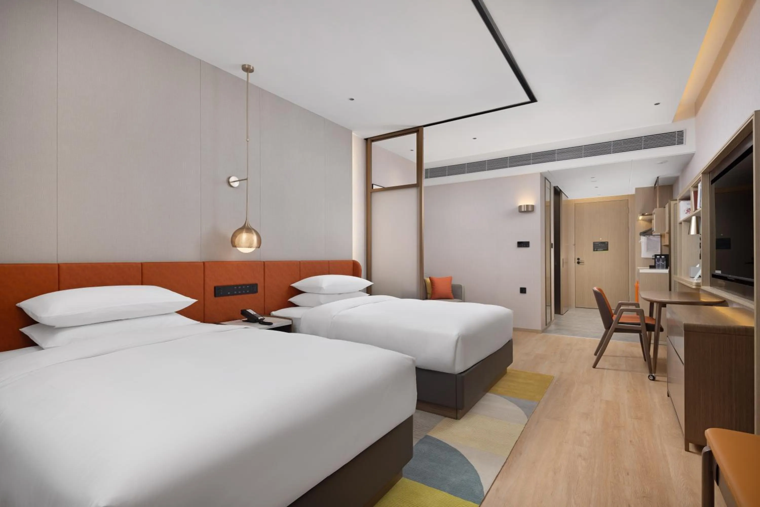 Bed in Home2 Suite by Hilton Dongguan Shipai