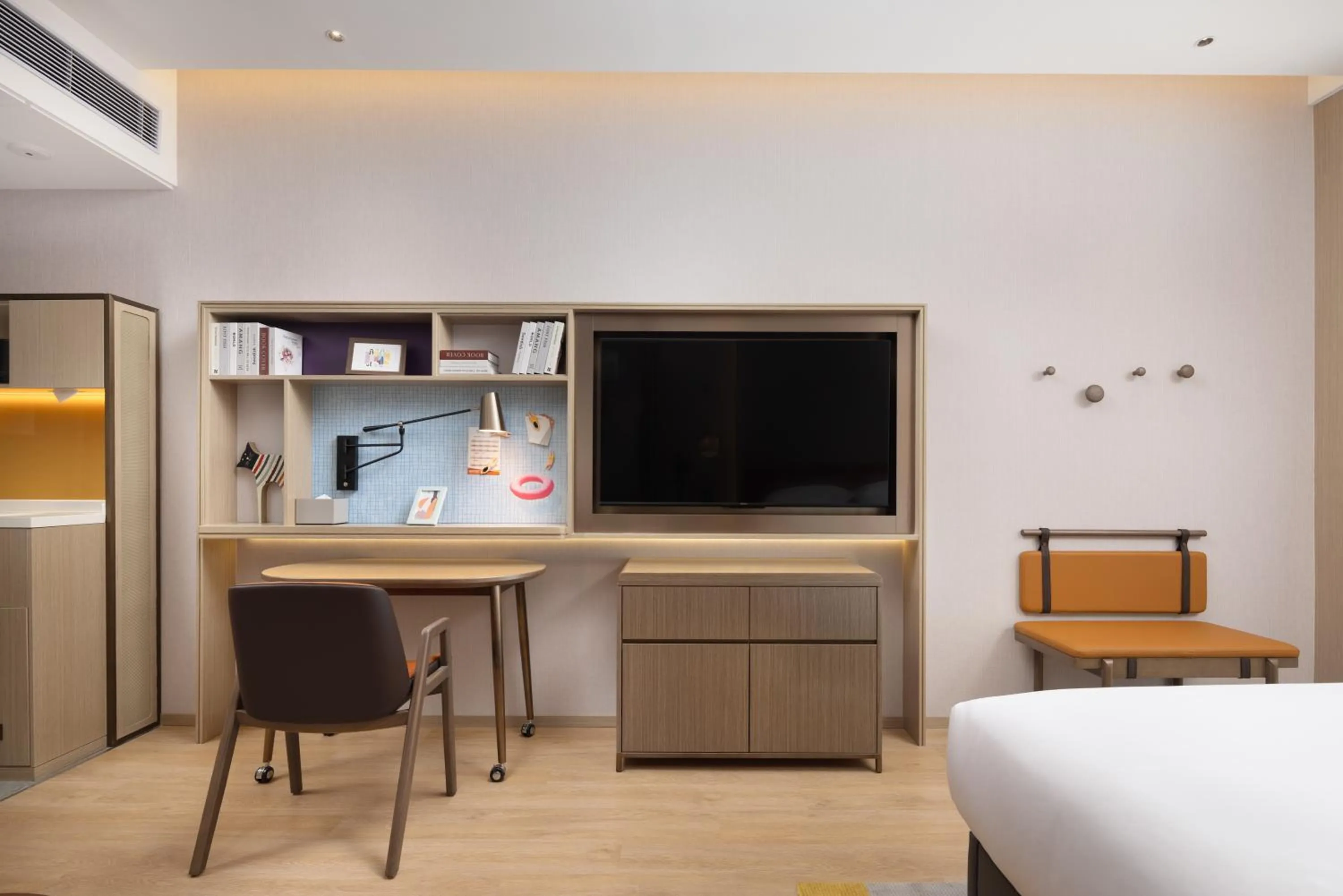 Bed in Home2 Suite by Hilton Dongguan Shipai