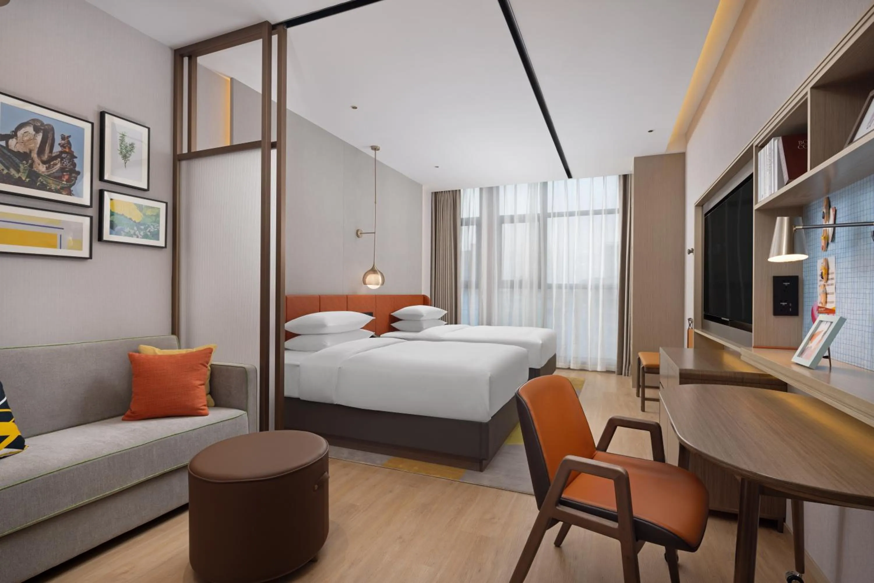 Bed in Home2 Suite by Hilton Dongguan Shipai