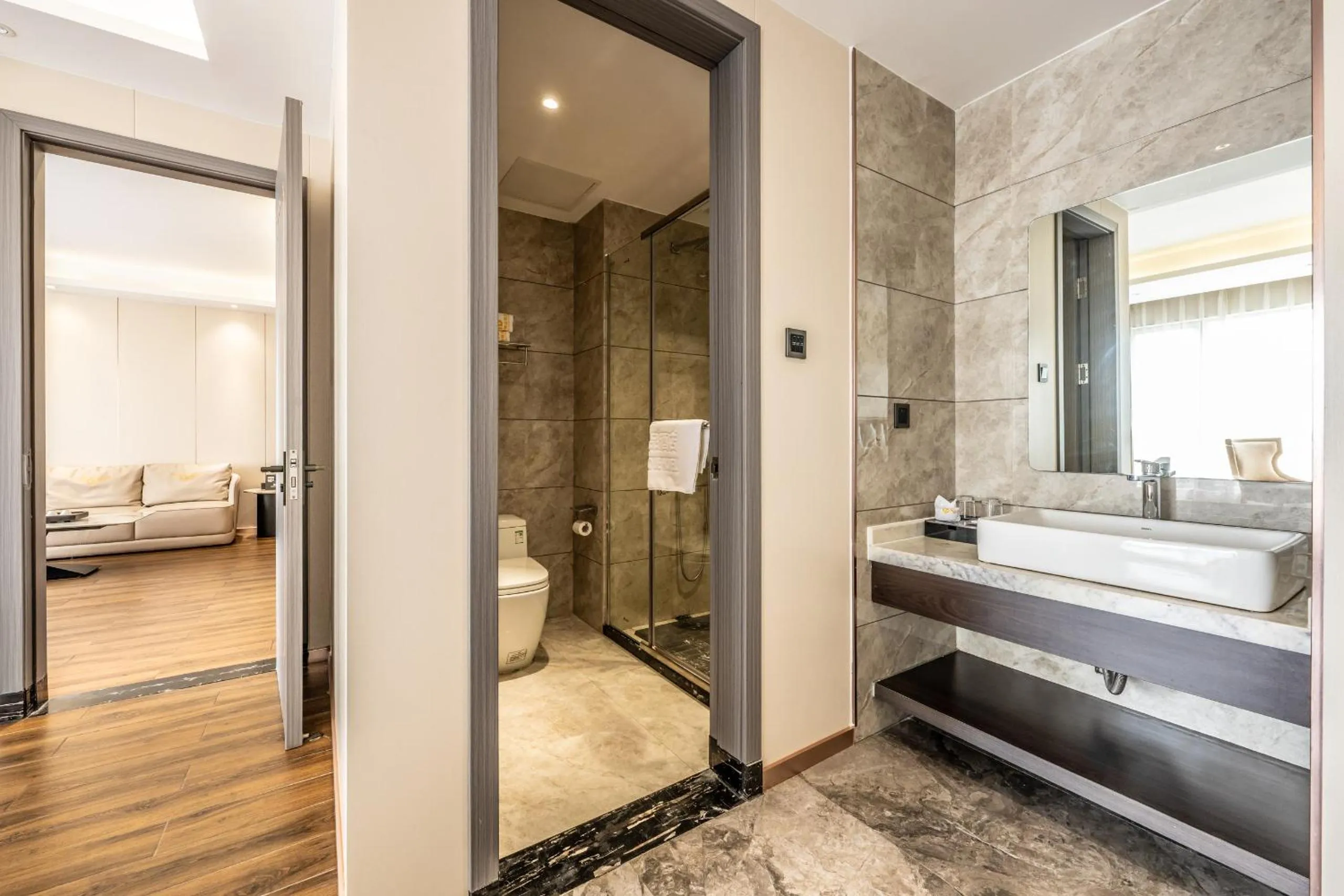 Bathroom, Bed in Bole Jing Pin Hotel