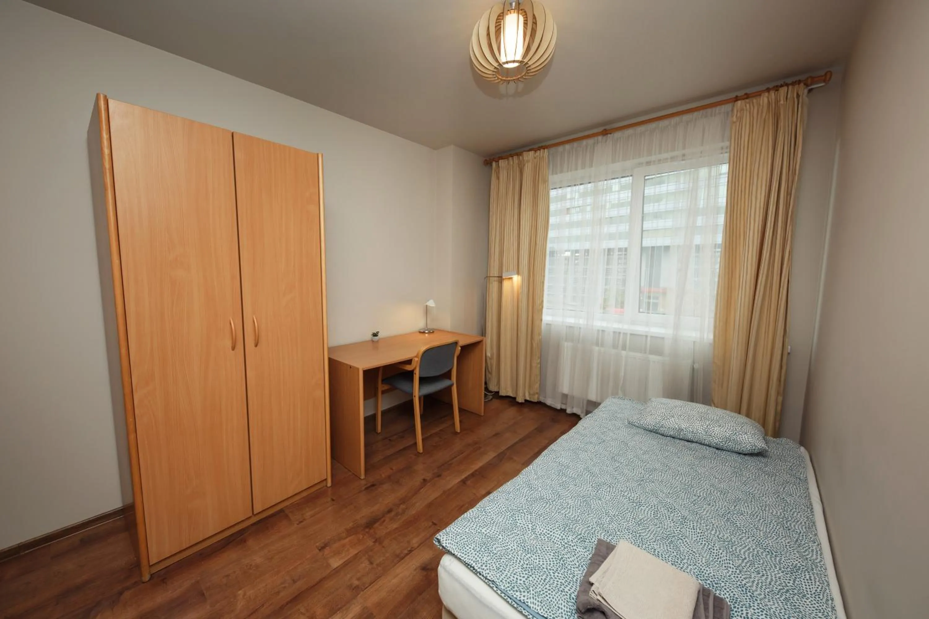 Photo of the whole room, Bed in RVR Smart Apartments Riga with Free Parking and Self Check-in