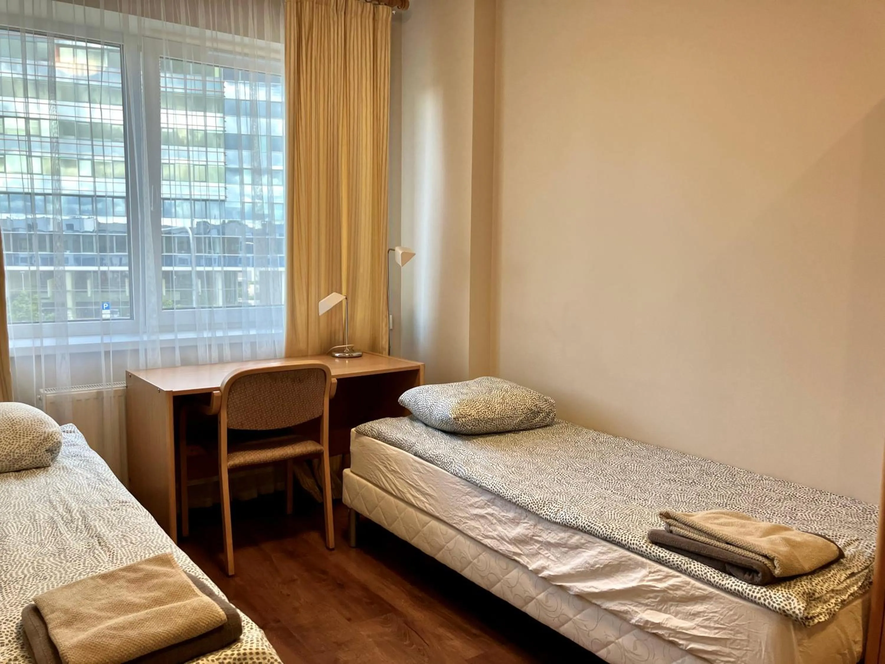 Photo of the whole room, Bed in RVR Smart Apartments Riga with Free Parking and Self Check-in