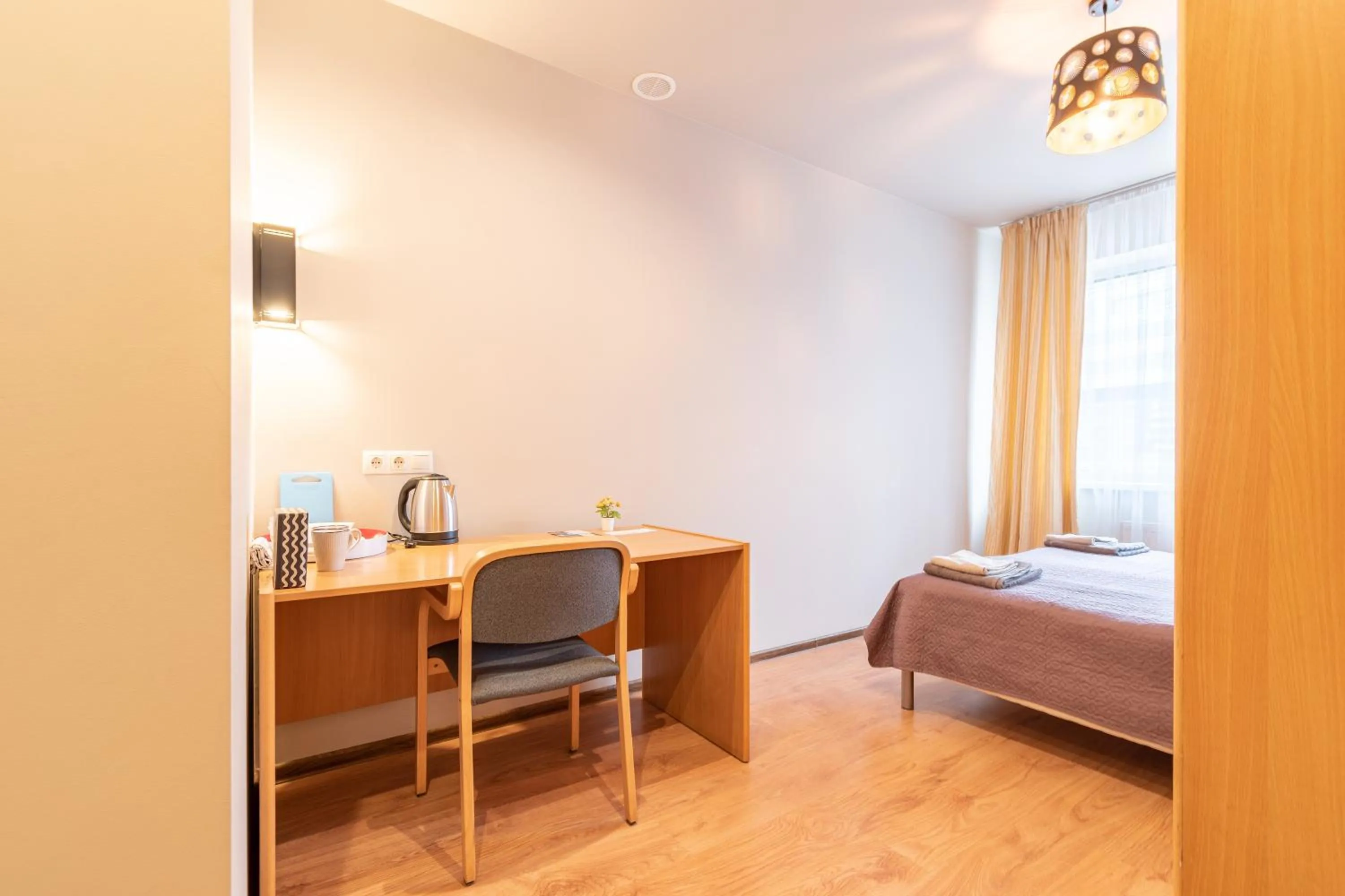 Photo of the whole room, Bed in RVR Smart Apartments Riga with Free Parking and Self Check-in