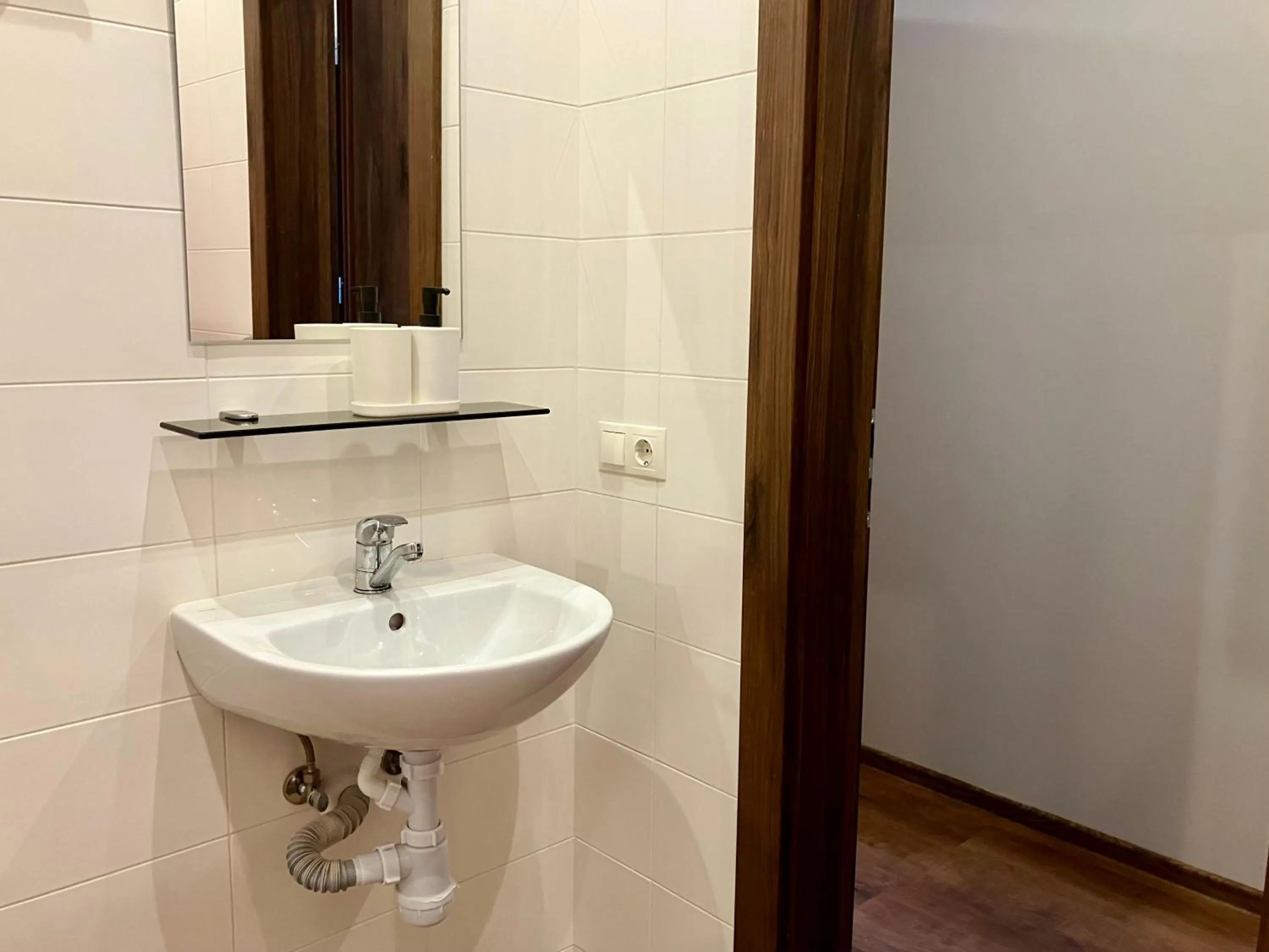 Bathroom in RVR Smart Apartments Riga with Free Parking and Self Check-in