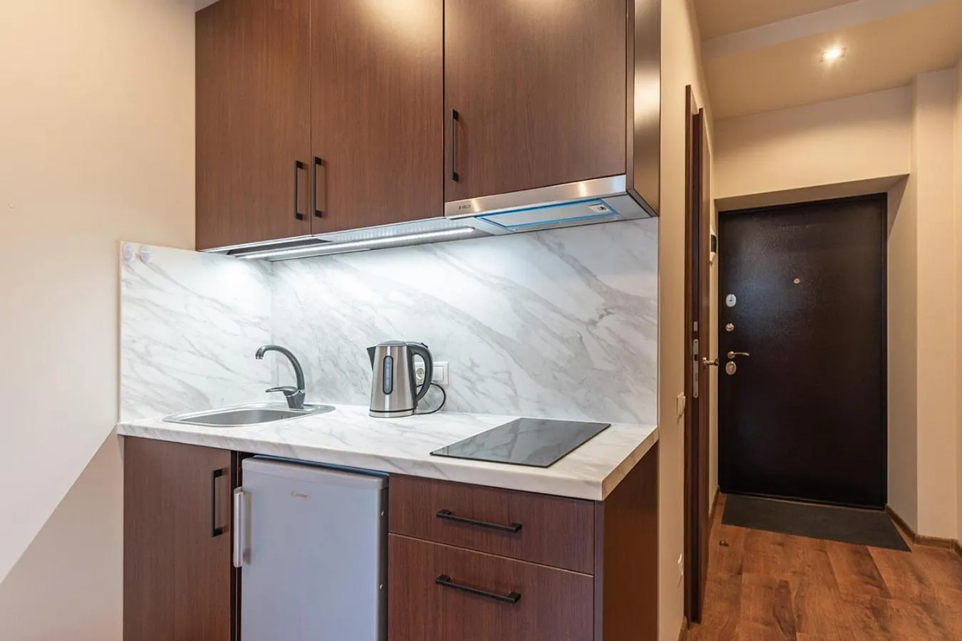 Kitchen or kitchenette in RVR Smart Apartments Riga with Free Parking and Self Check-in