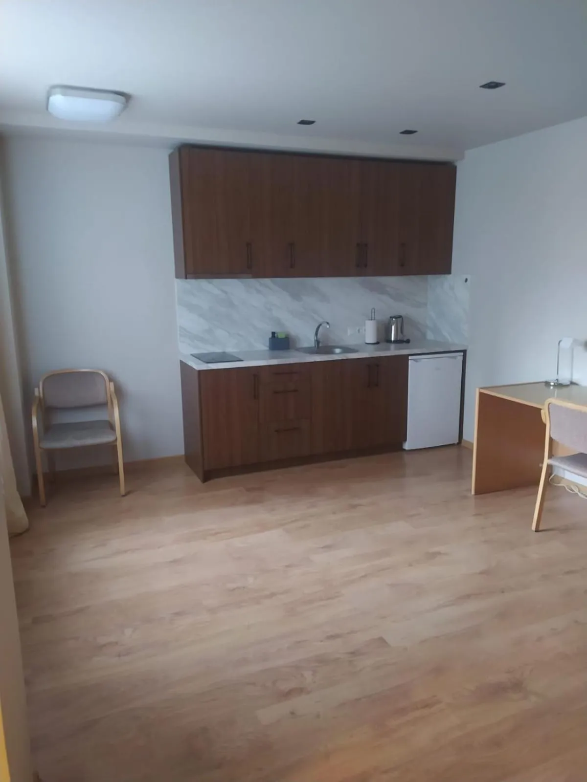 Kitchen or kitchenette in RVR Smart Apartments Riga with Free Parking and Self Check-in
