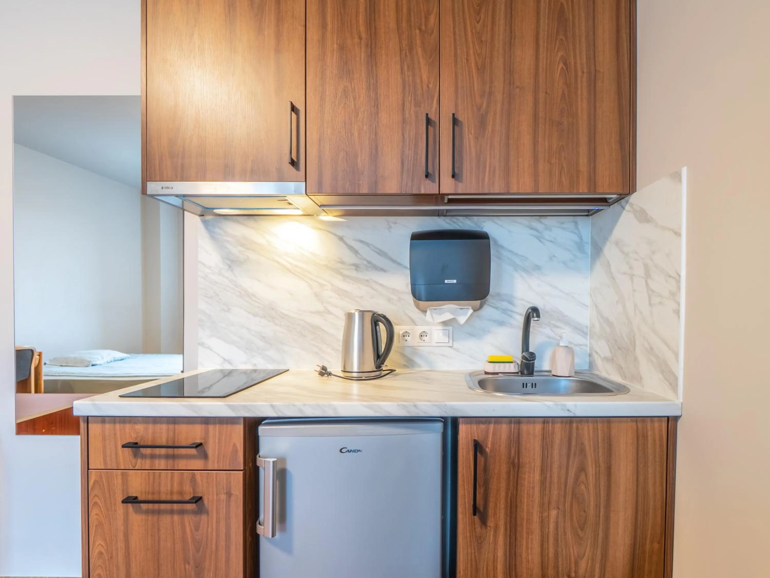 Kitchen or kitchenette in RVR Smart Apartments Riga with Free Parking and Self Check-in