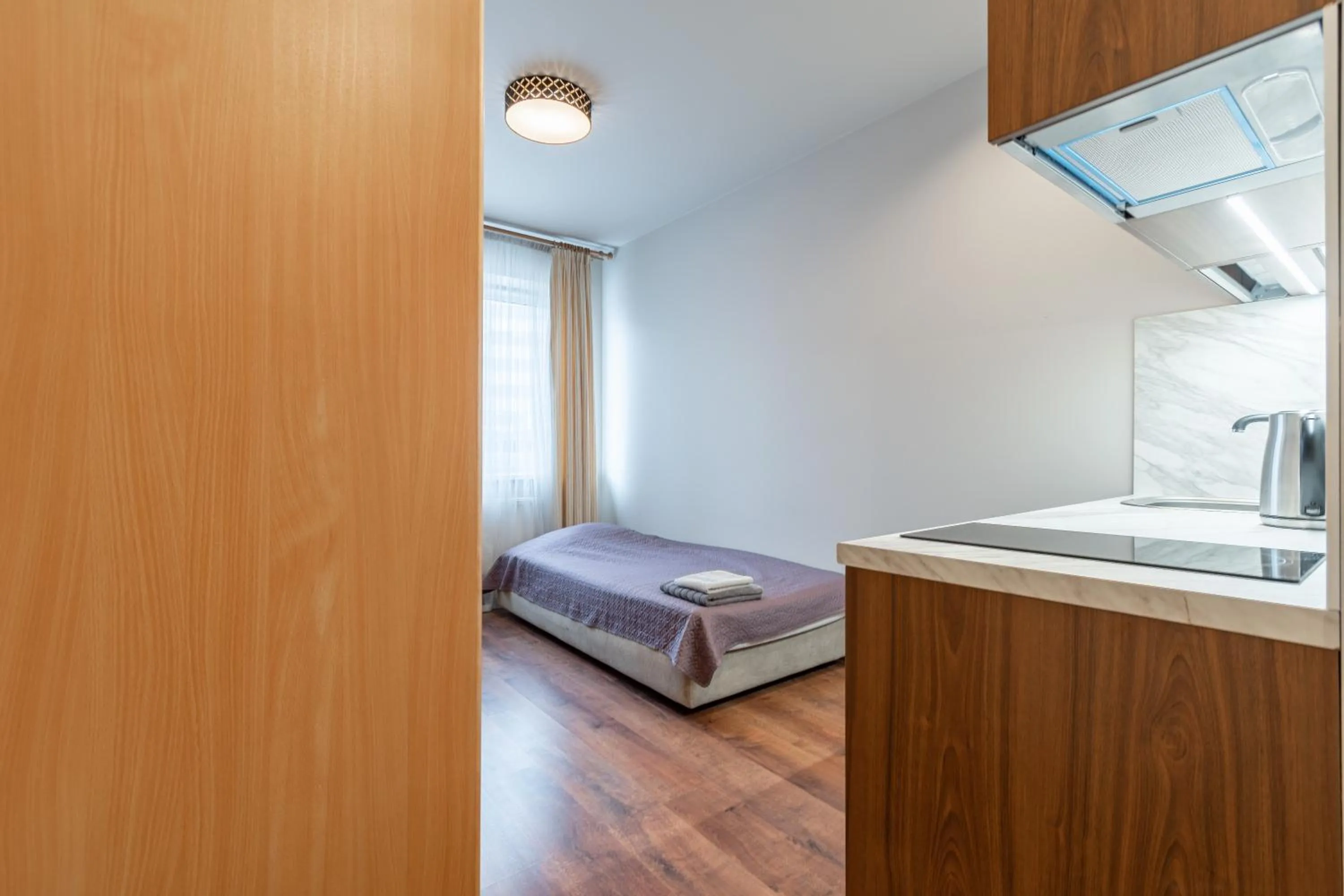 Photo of the whole room, Bed in RVR Smart Apartments Riga with Free Parking and Self Check-in