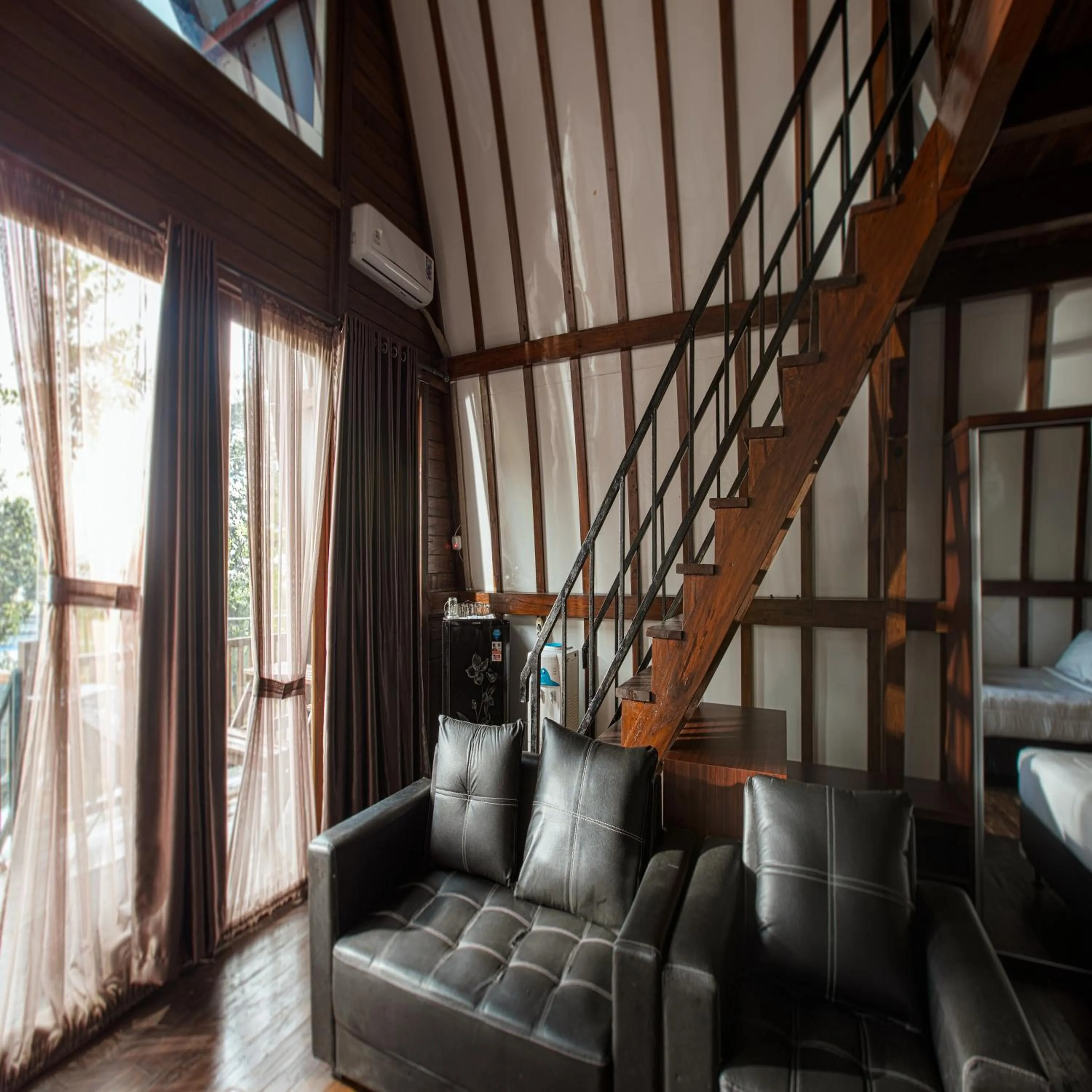 Living room in Green Panorama Resort by MHM