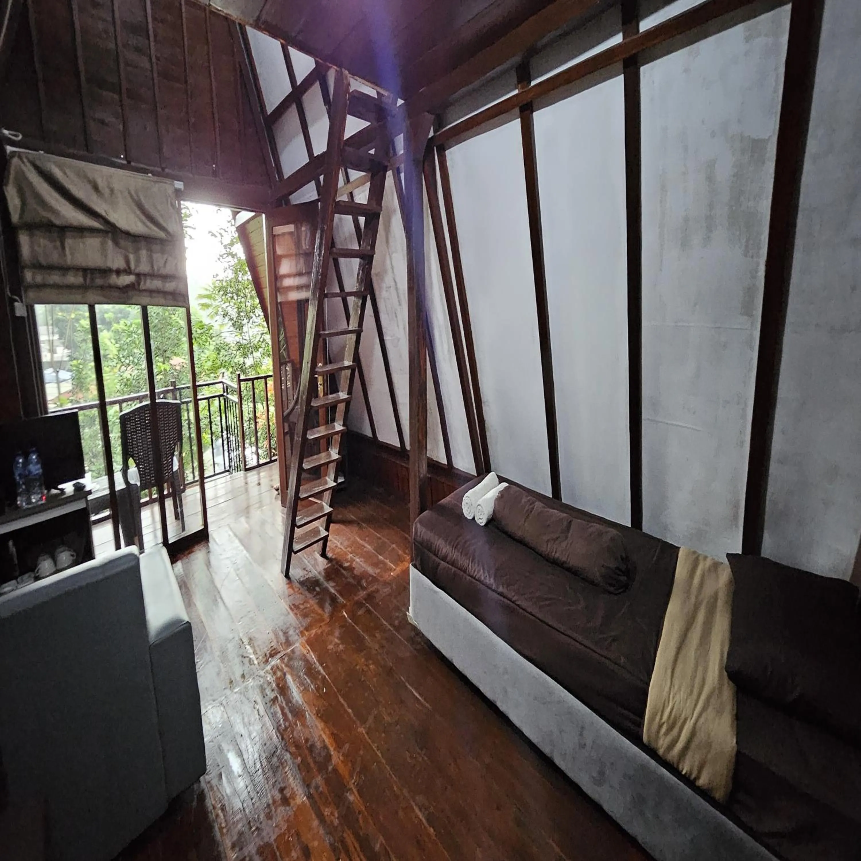 Living room in Green Panorama Resort by MHM