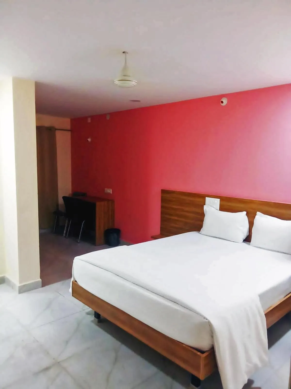 Bedroom in Udupi Deluxe Lodge Gulbarga