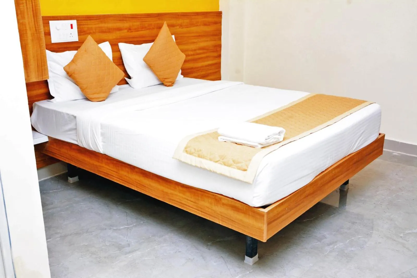 Bedroom in Udupi Deluxe Lodge Gulbarga
