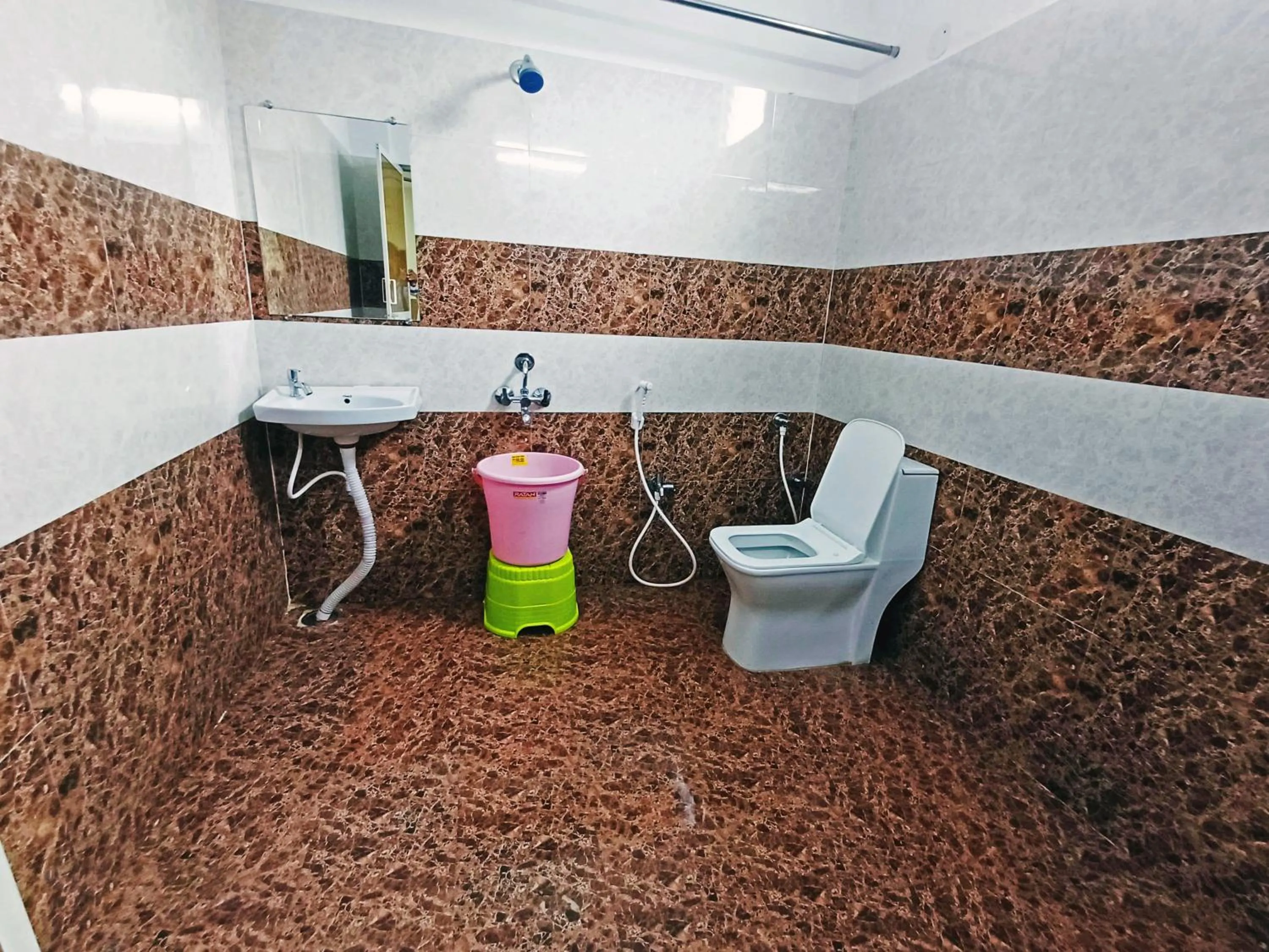Bathroom in Udupi Deluxe Lodge Gulbarga