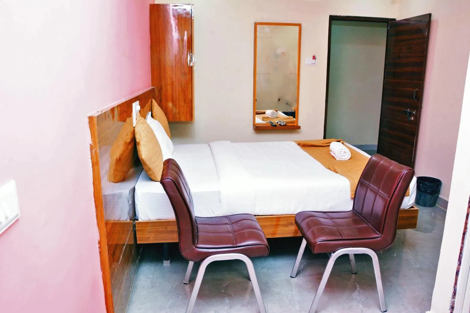 Bedroom in Udupi Deluxe Lodge Gulbarga