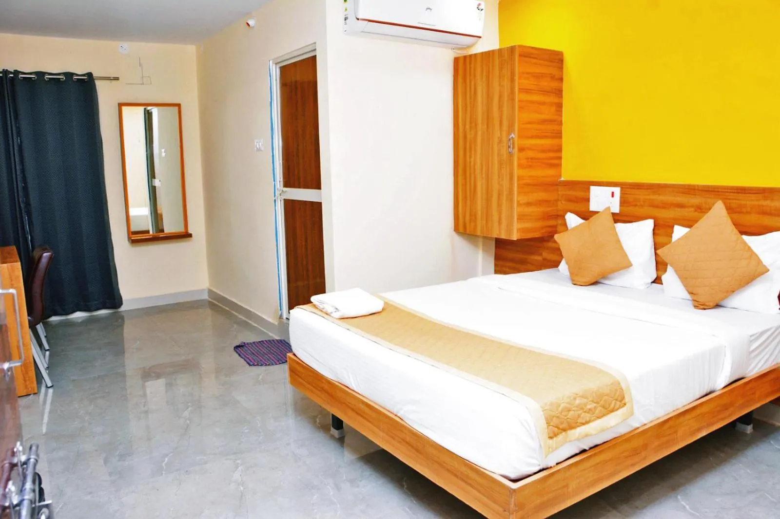 Bedroom in Udupi Deluxe Lodge Gulbarga